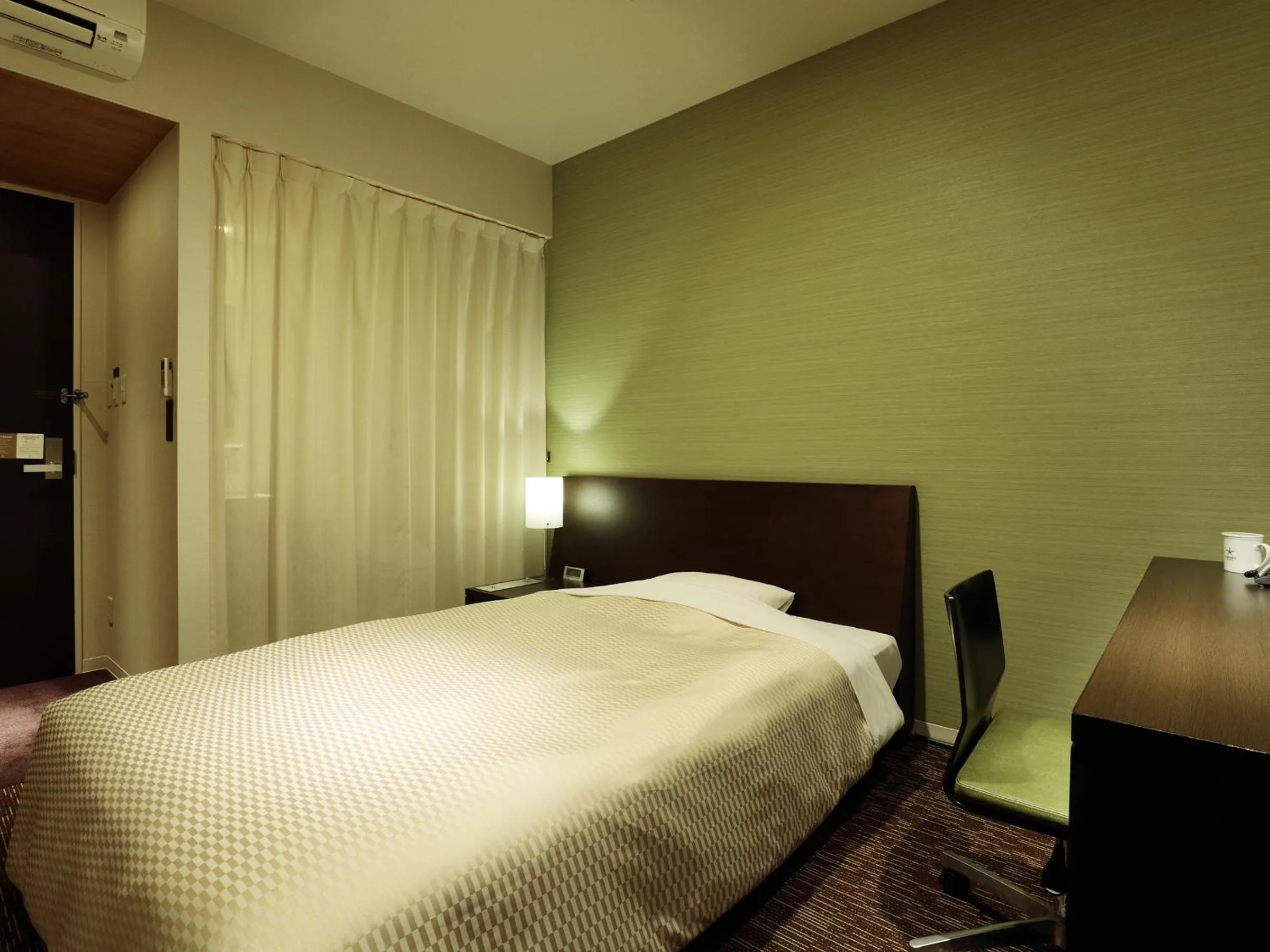 Bed in Candeo Hotels Shizuoka Shimada