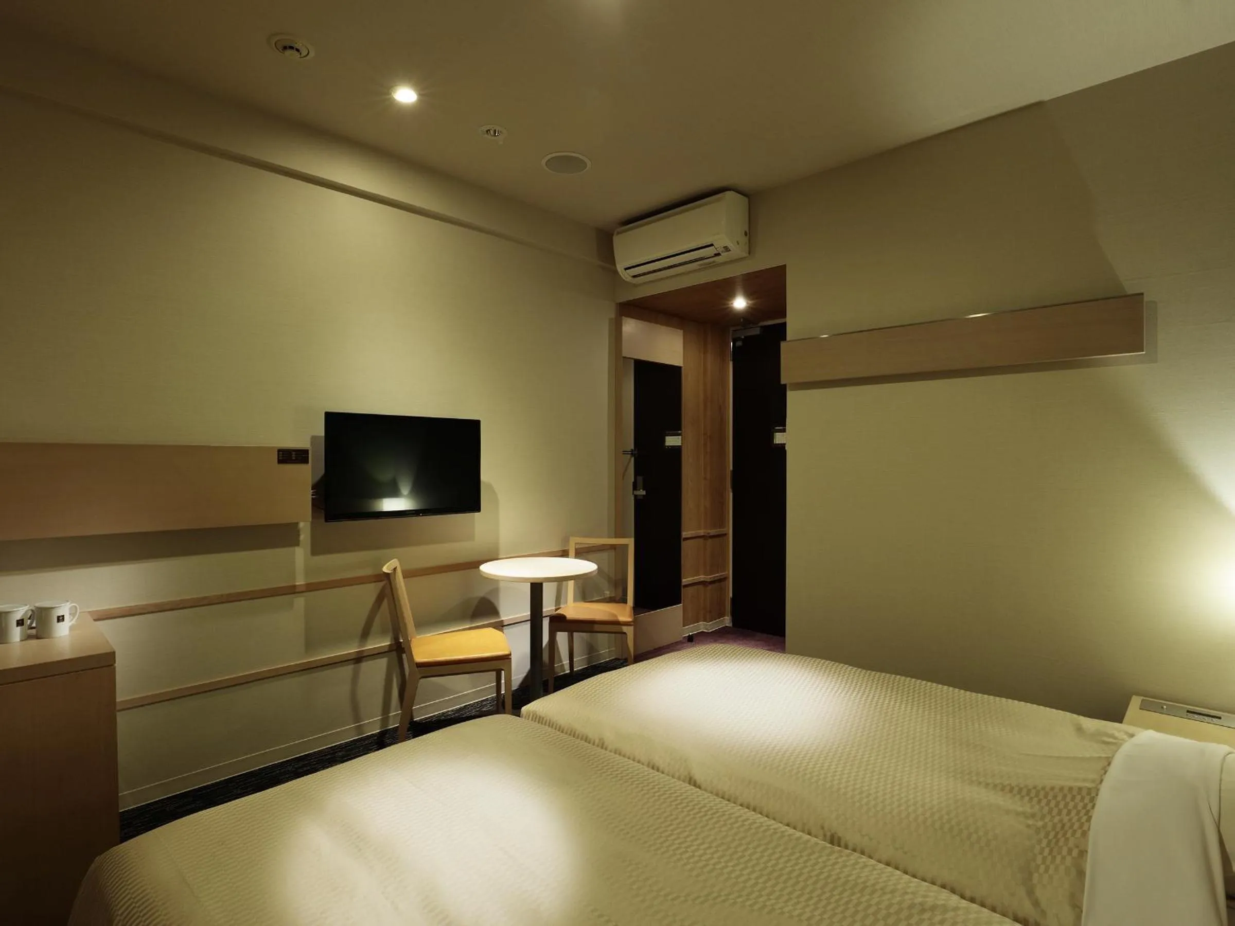 Bed in Candeo Hotels Shizuoka Shimada