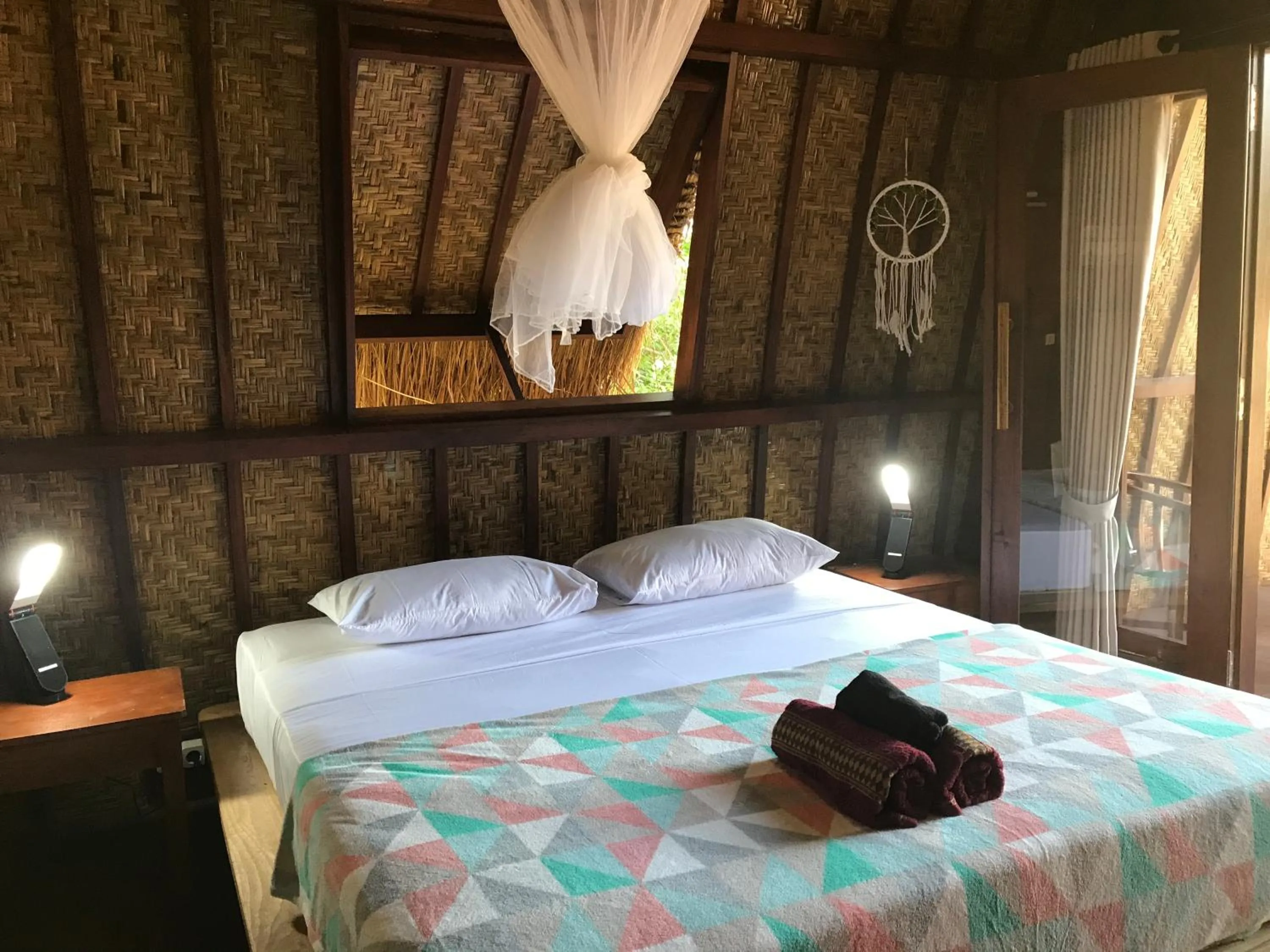 Bed in Meno Madia Bungalows