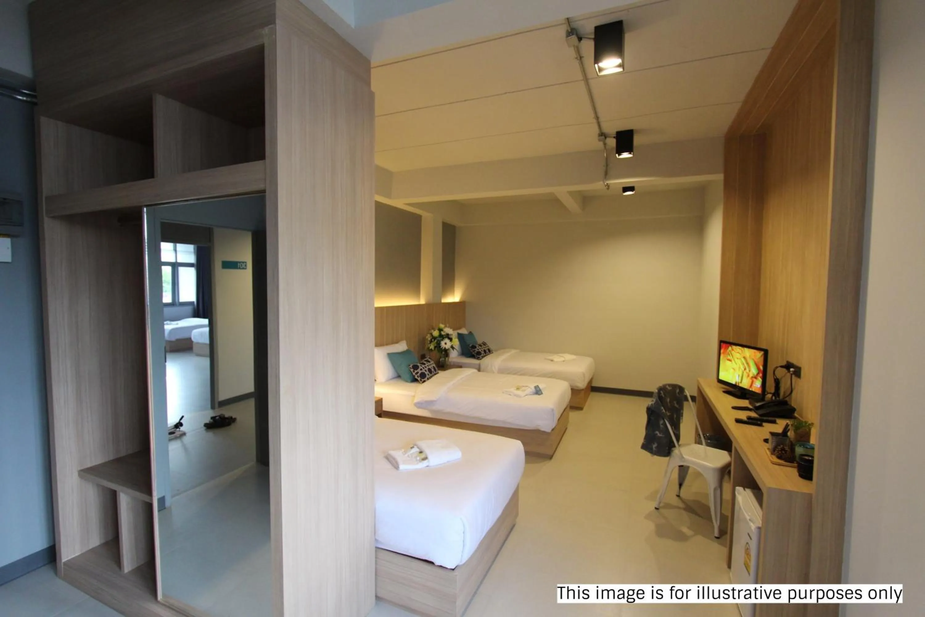 Photo of the whole room, Bed in Rajthani Hotel - SHA Certified