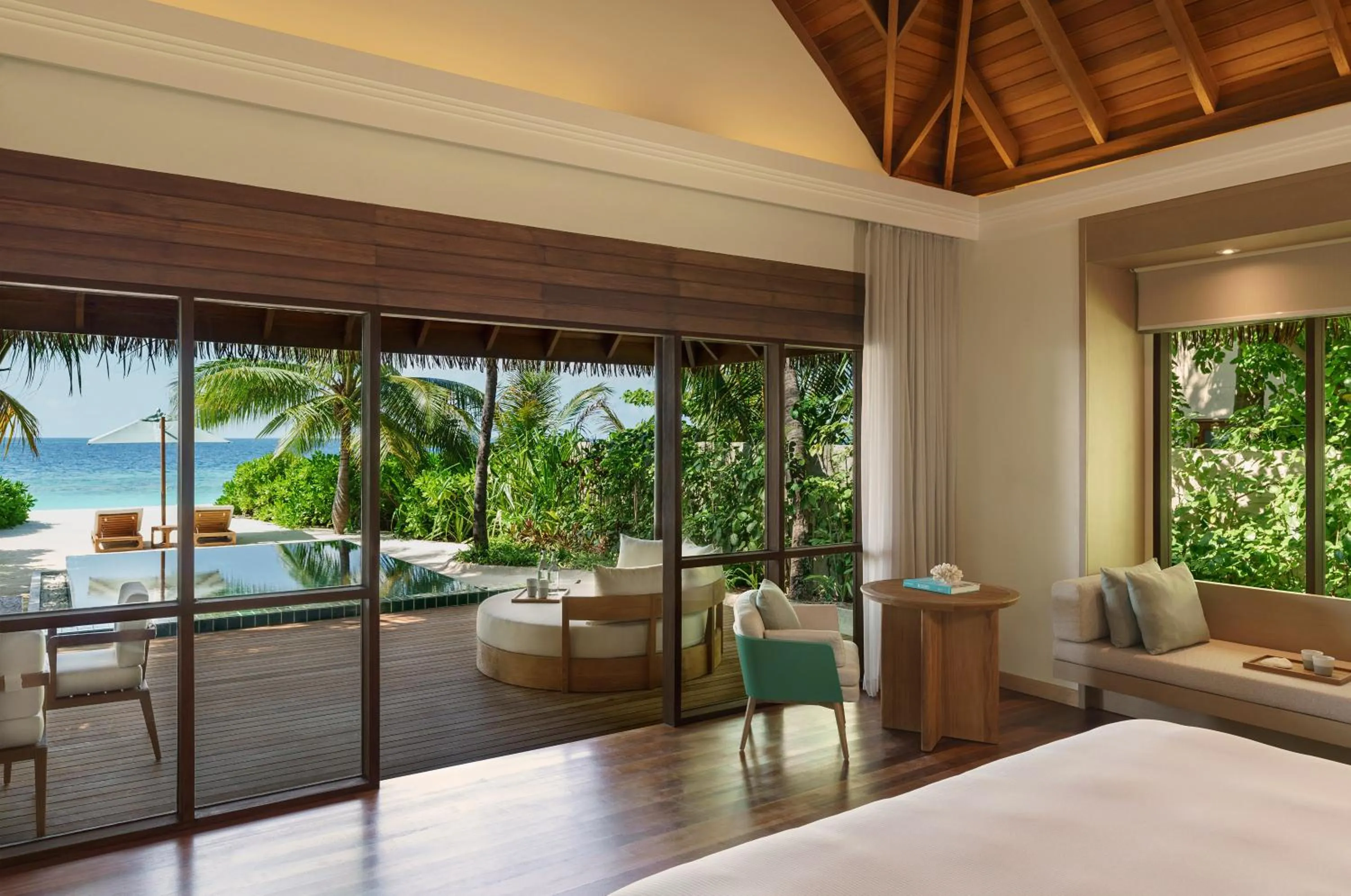 Seating area, Bed in Huvafen Fushi Maldives