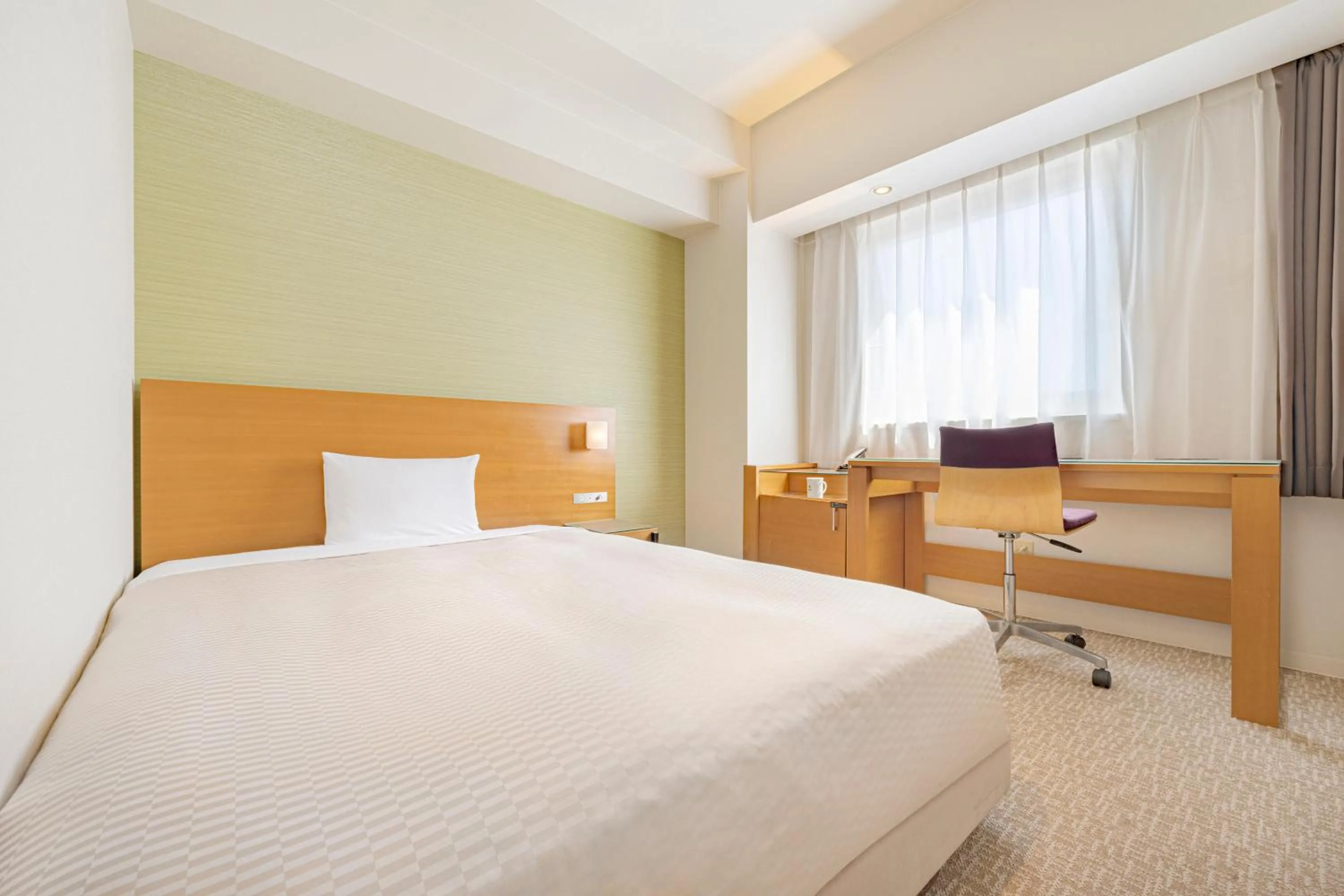 Photo of the whole room, Bed in Candeo Hotels Fukuyama