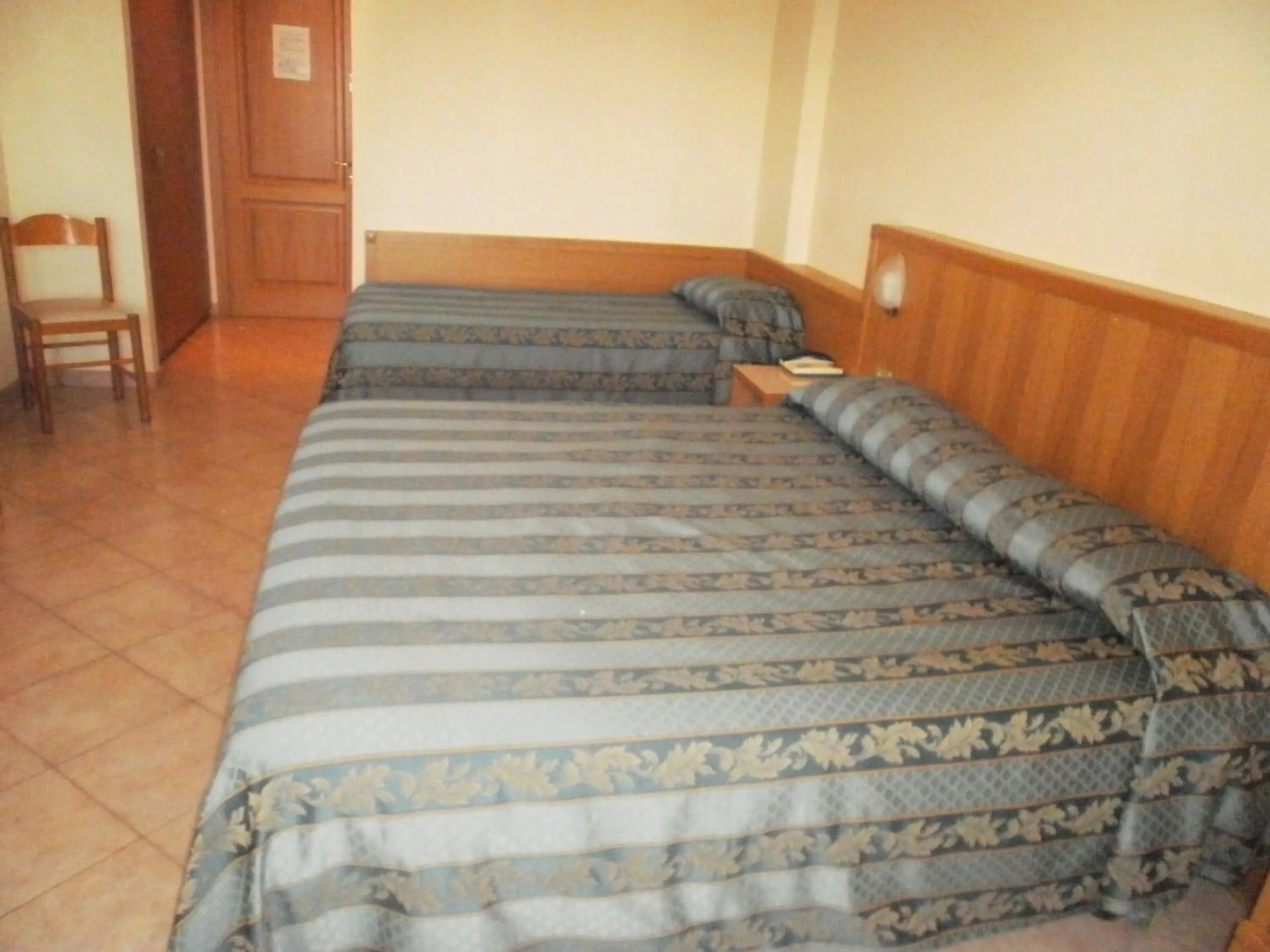 Bed in Hotel Manzoni