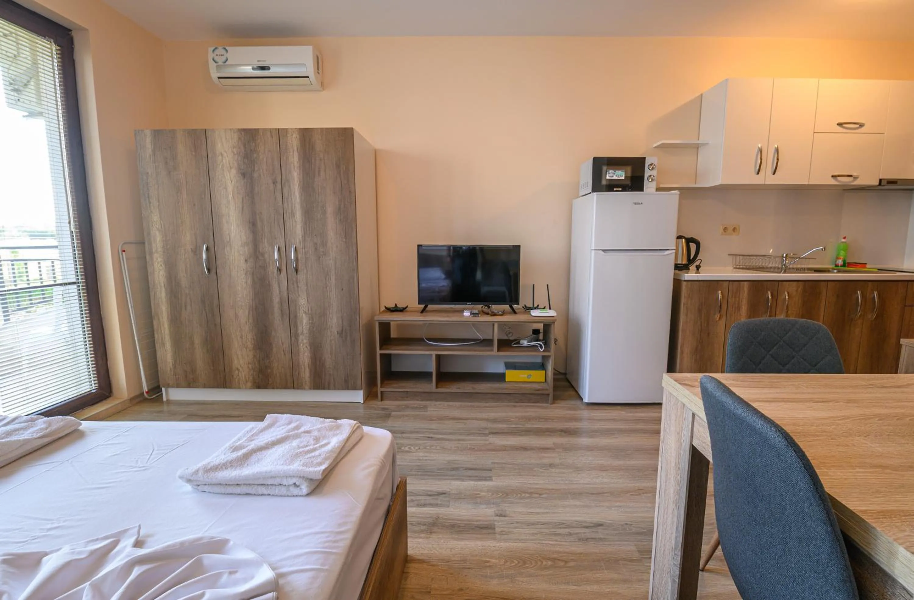 Dining area, Bed in Apollon Apartments