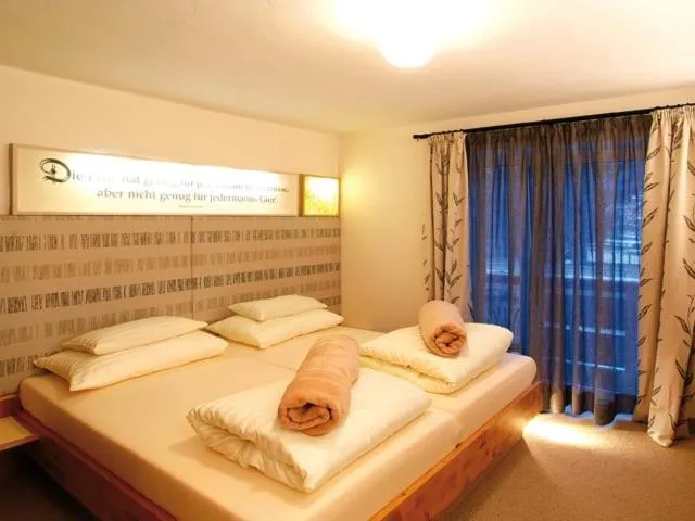 Bed in Hotel Riederhof- Urlaub mit WAU!