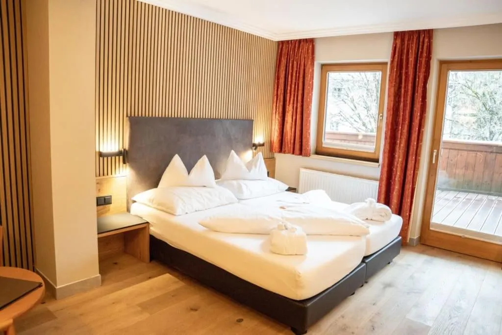 Bed in Hotel Riederhof- Urlaub mit WAU!