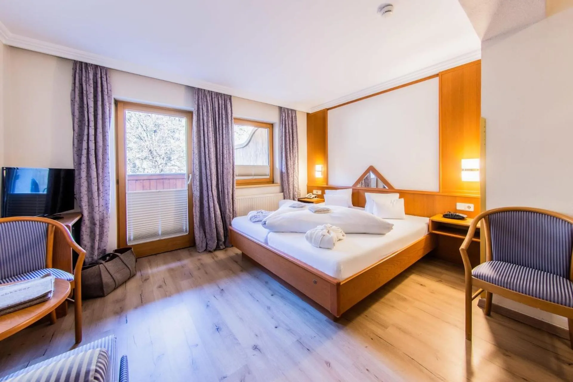 Bed in Hotel Riederhof- Urlaub mit WAU!