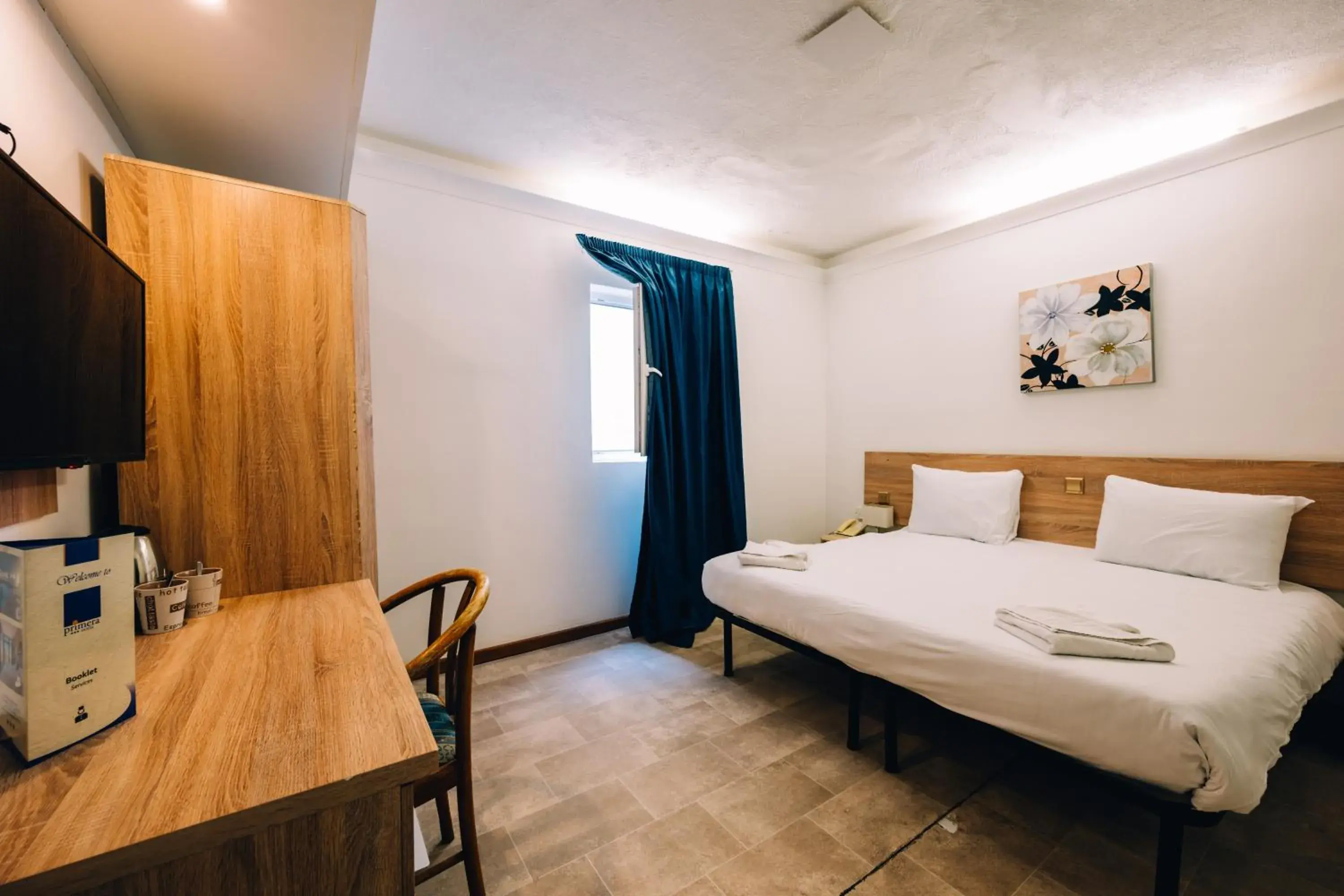 Bed in Primera Hotel Bed in Primera Hotel