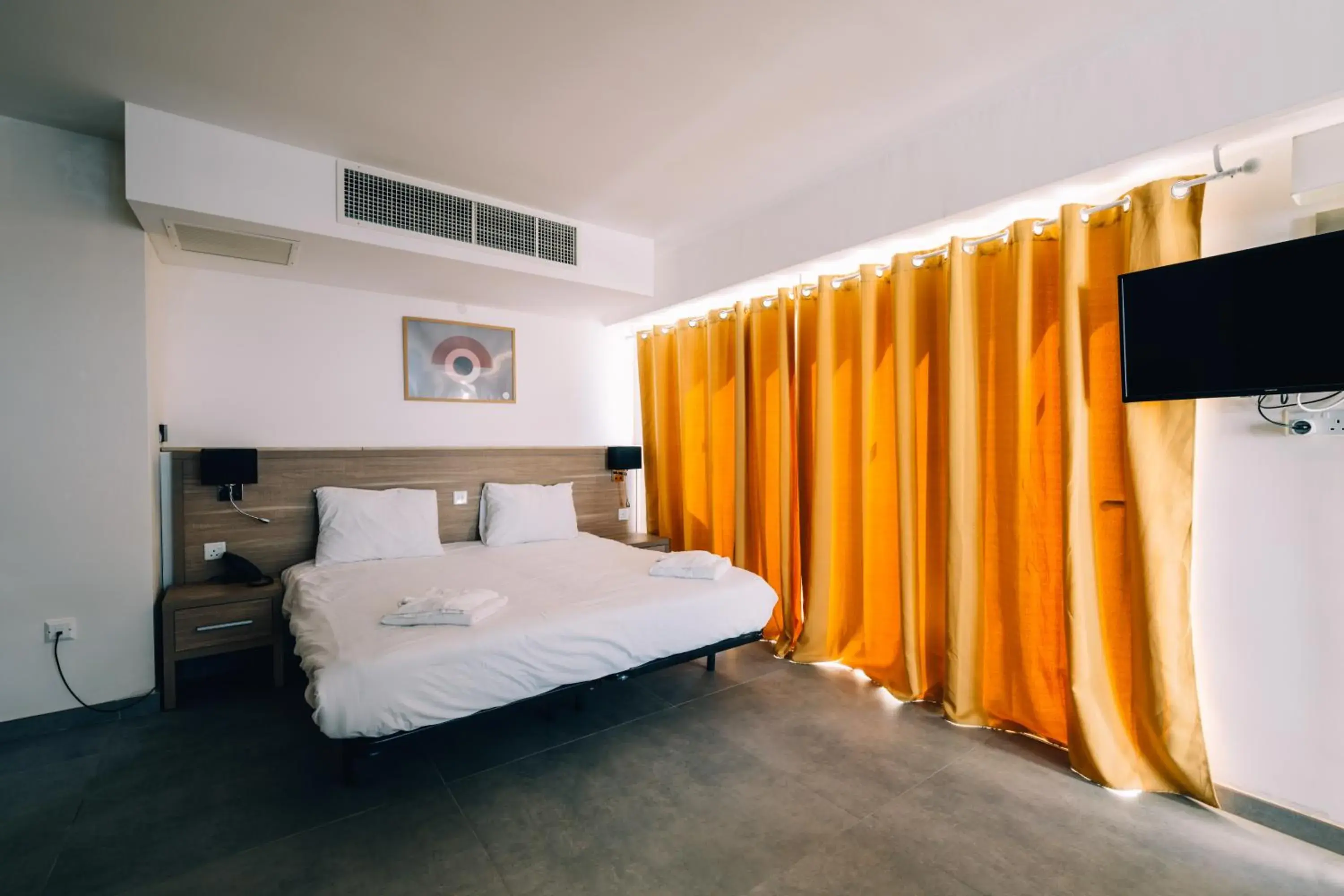 Bed in Primera Hotel Bed in Primera Hotel