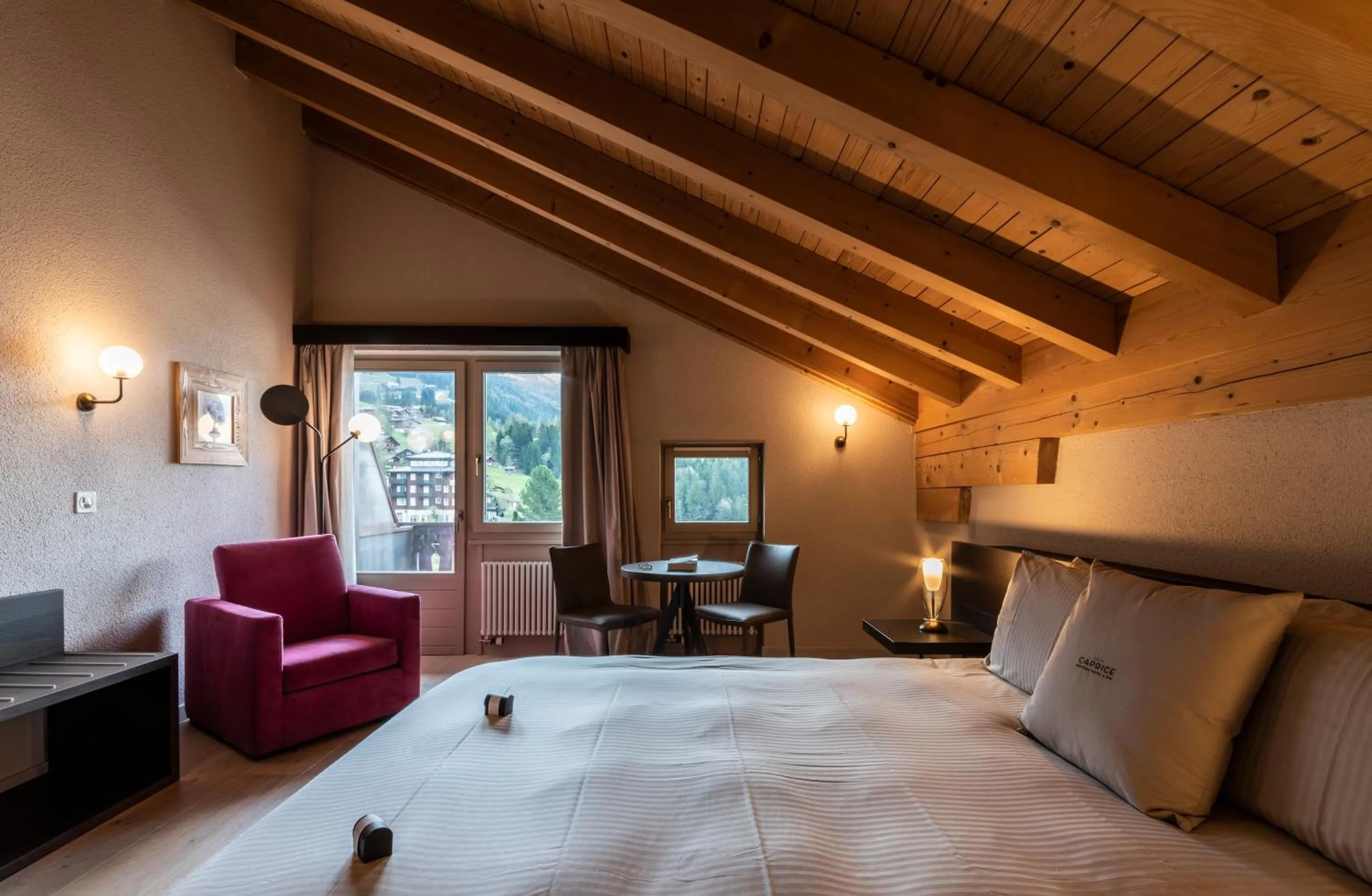 Bed in Hotel Maya Caprice