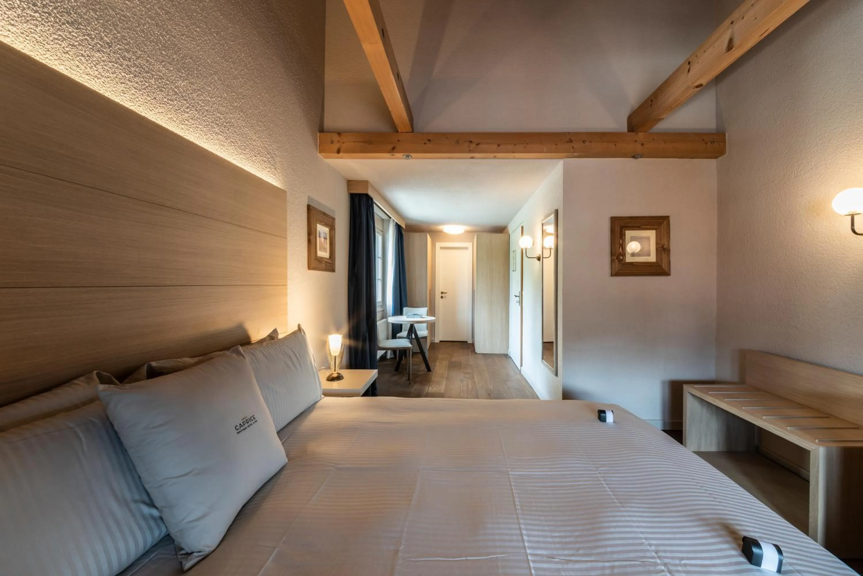 Bed in Hotel Maya Caprice