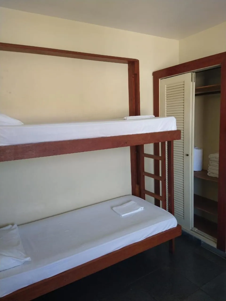 Bed in Pousada Genesis