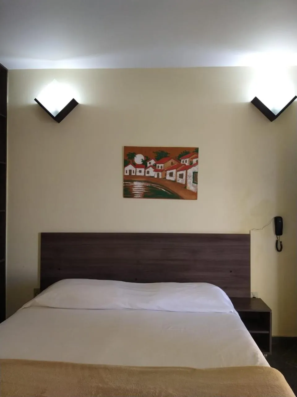 Bed in Pousada Genesis