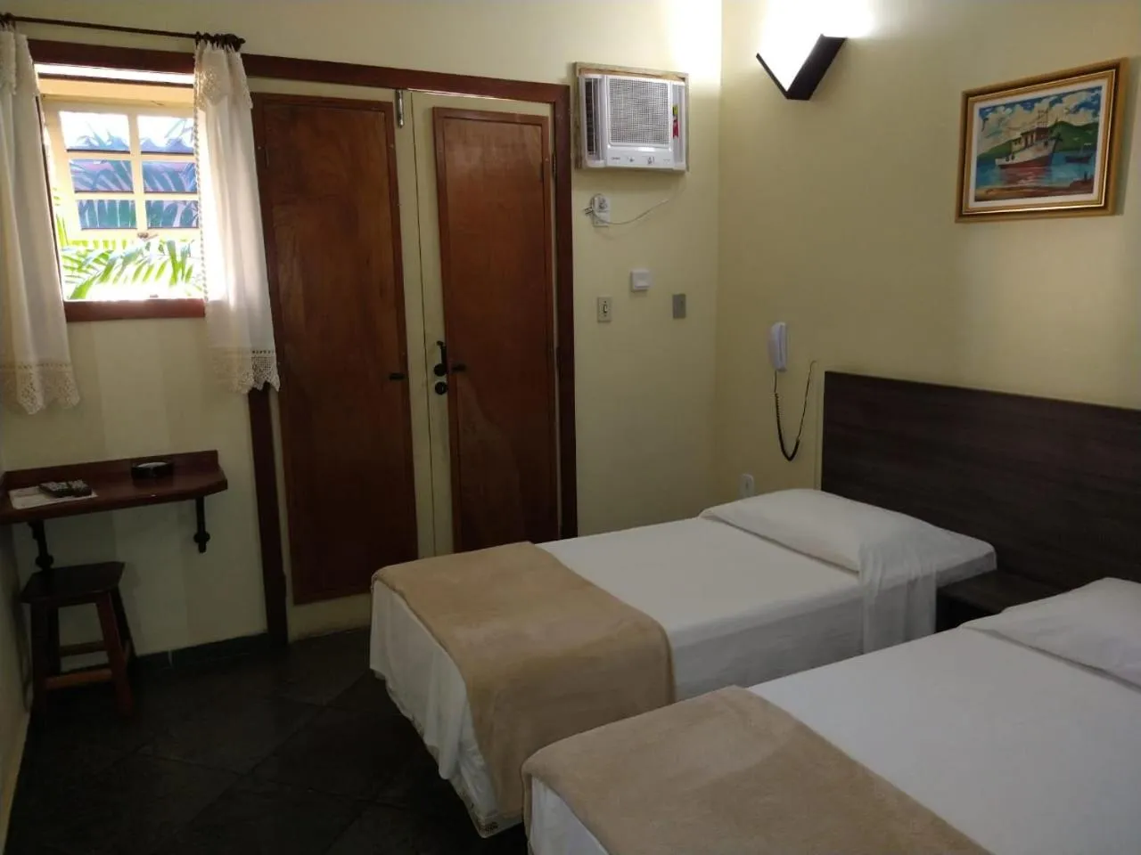 Bed in Pousada Genesis