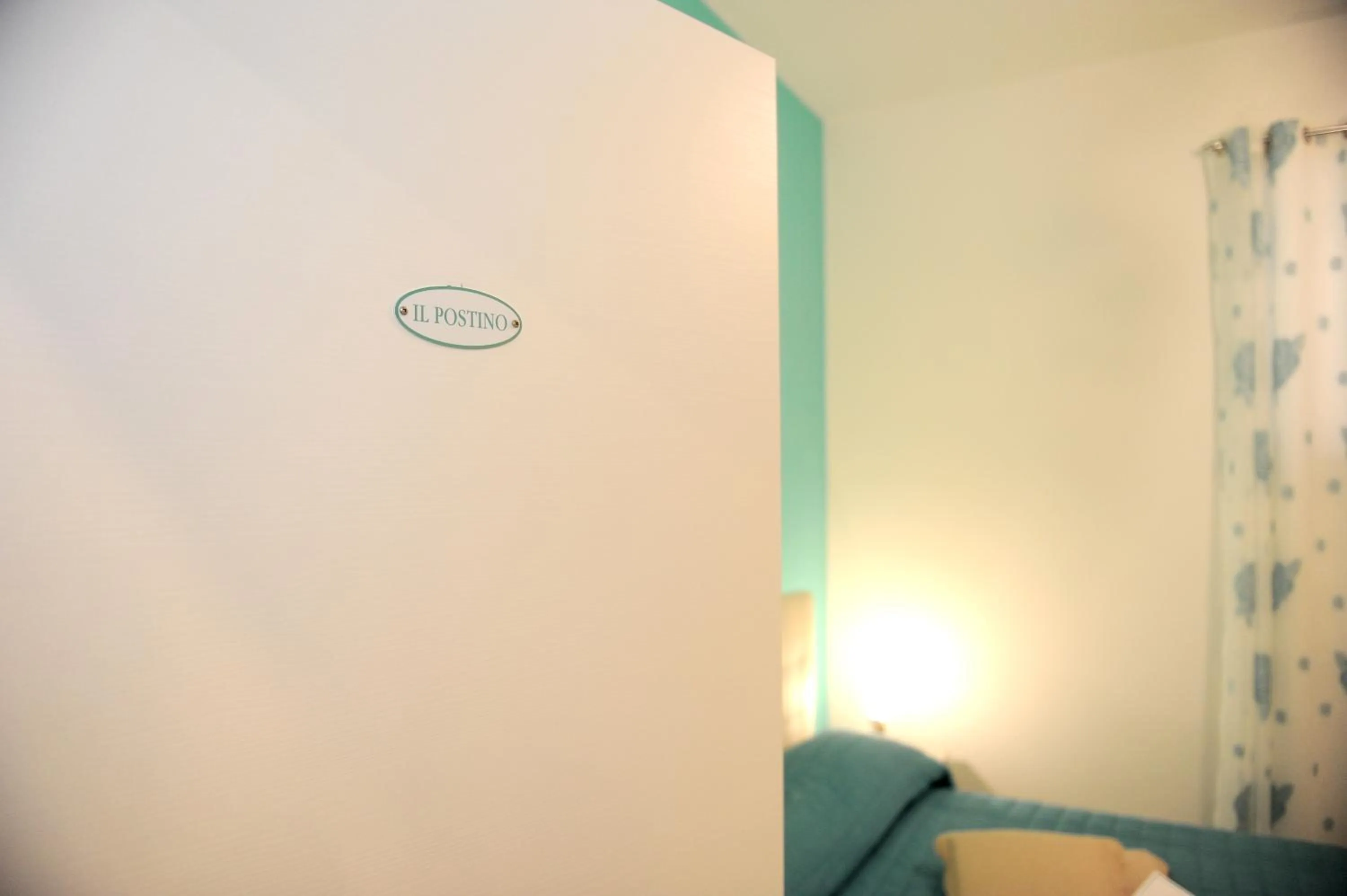 Bedroom in L'Isola Del Postino Rooms