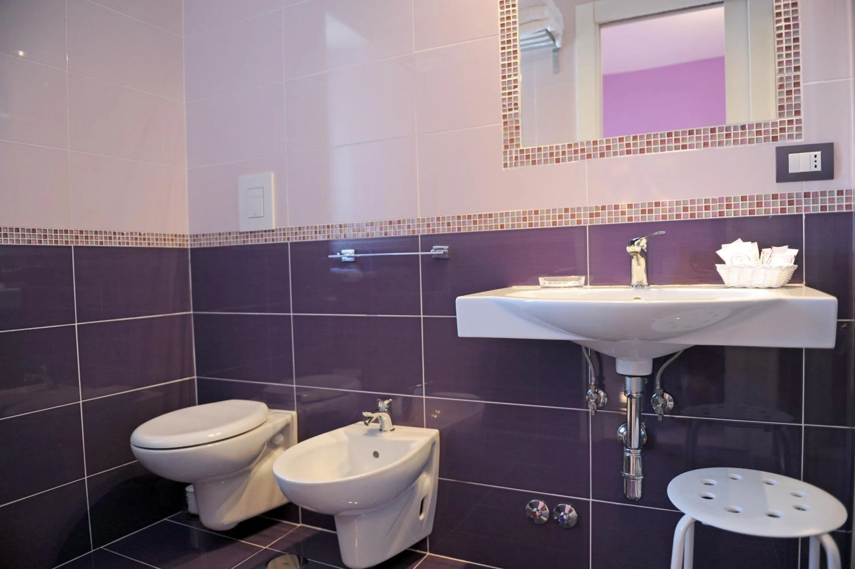 Toilet in L'Isola Del Postino Rooms