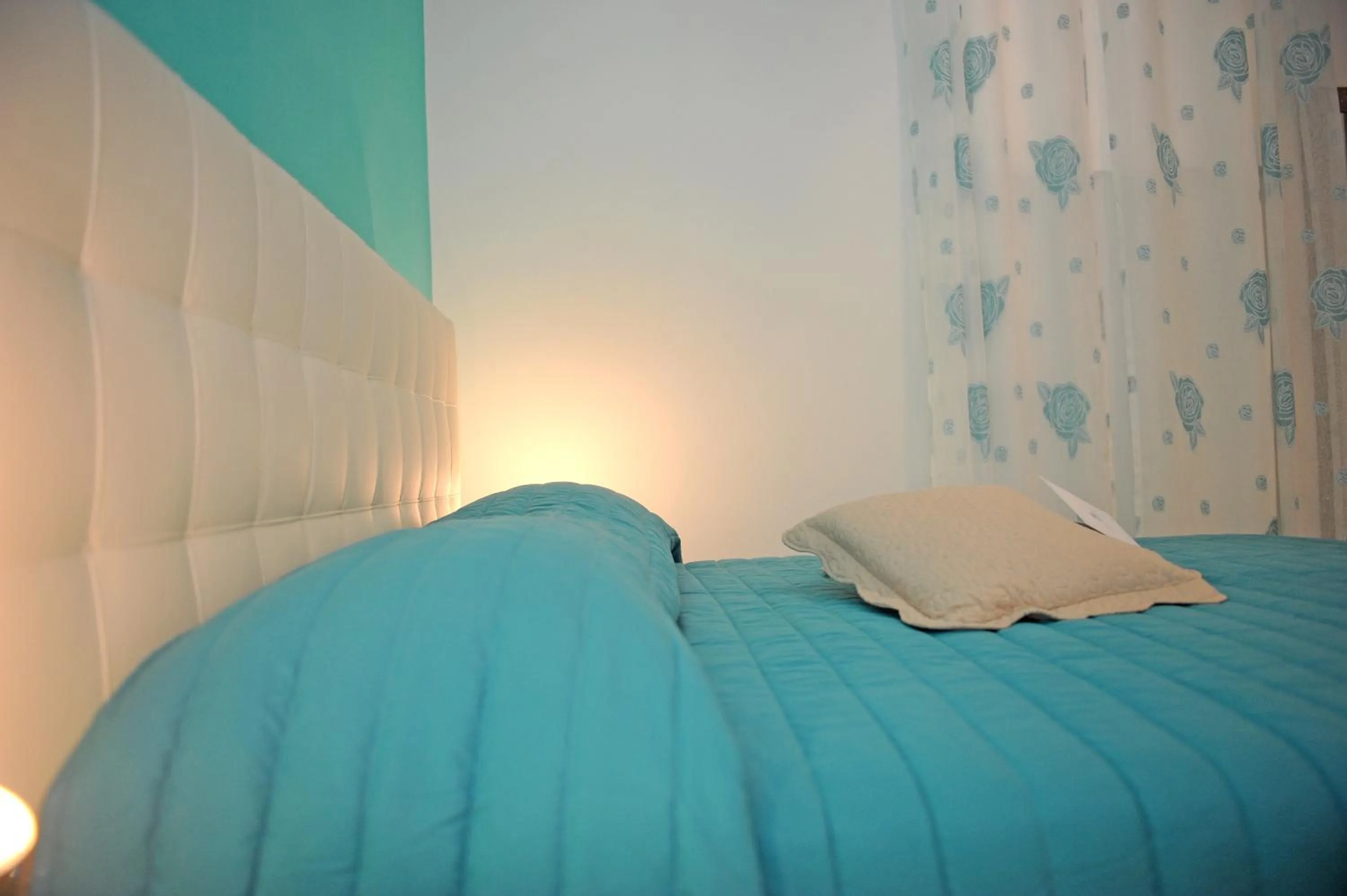 Bedroom in L'Isola Del Postino Rooms
