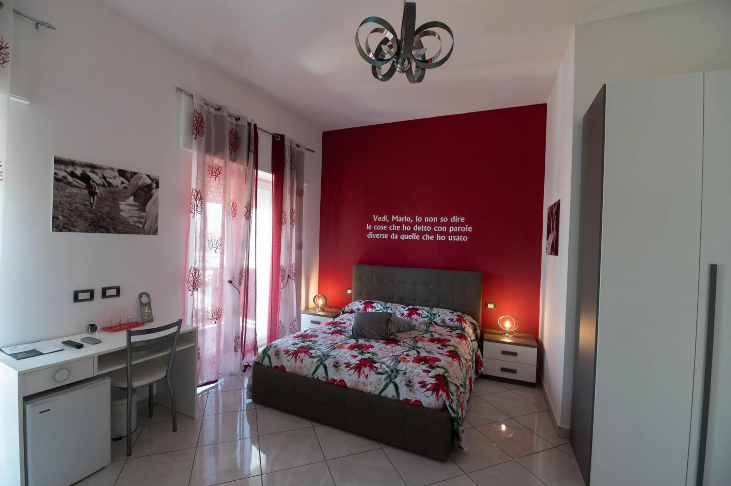 Bed in L'Isola Del Postino Rooms