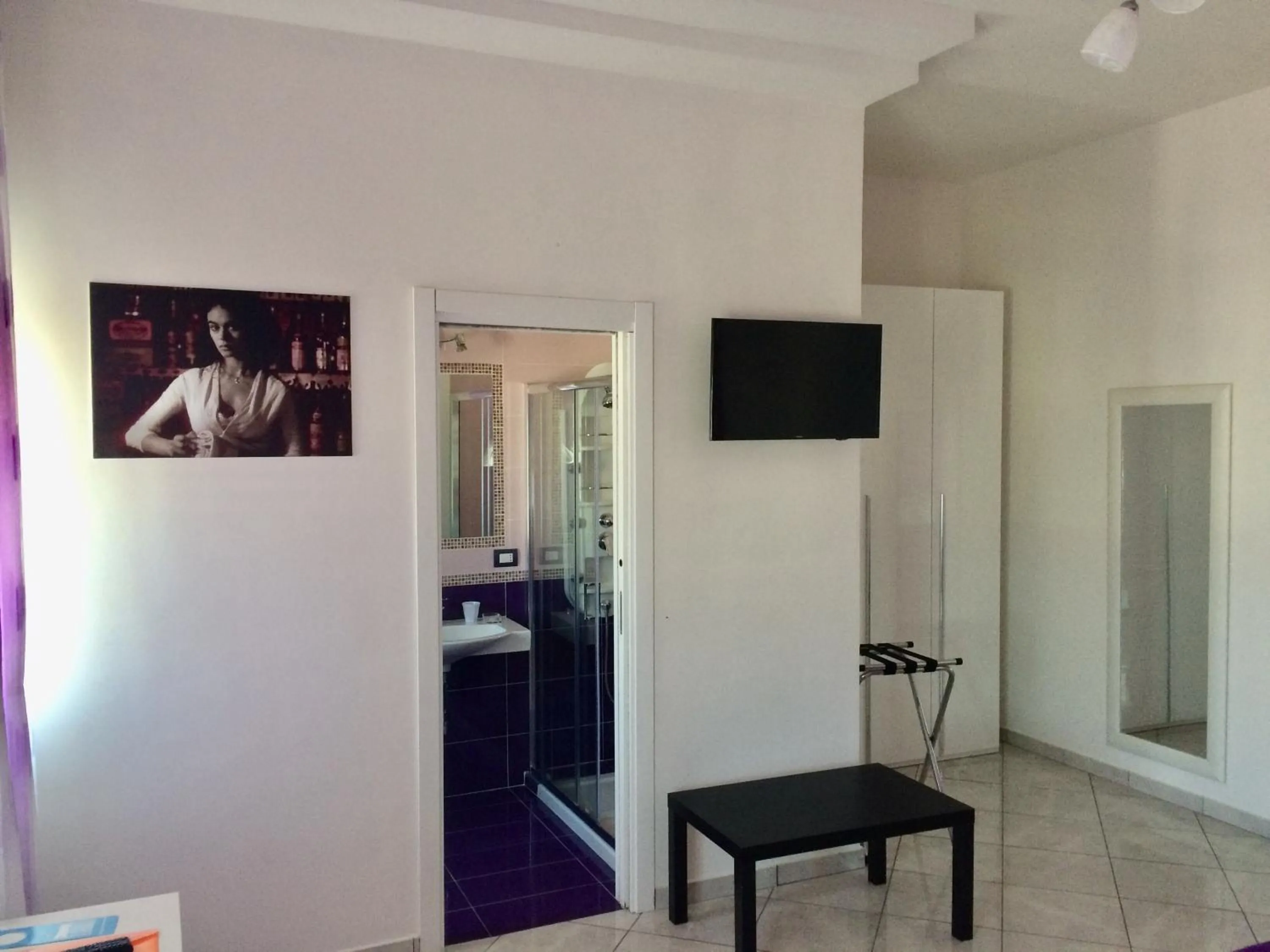 TV and multimedia in L'Isola Del Postino Rooms