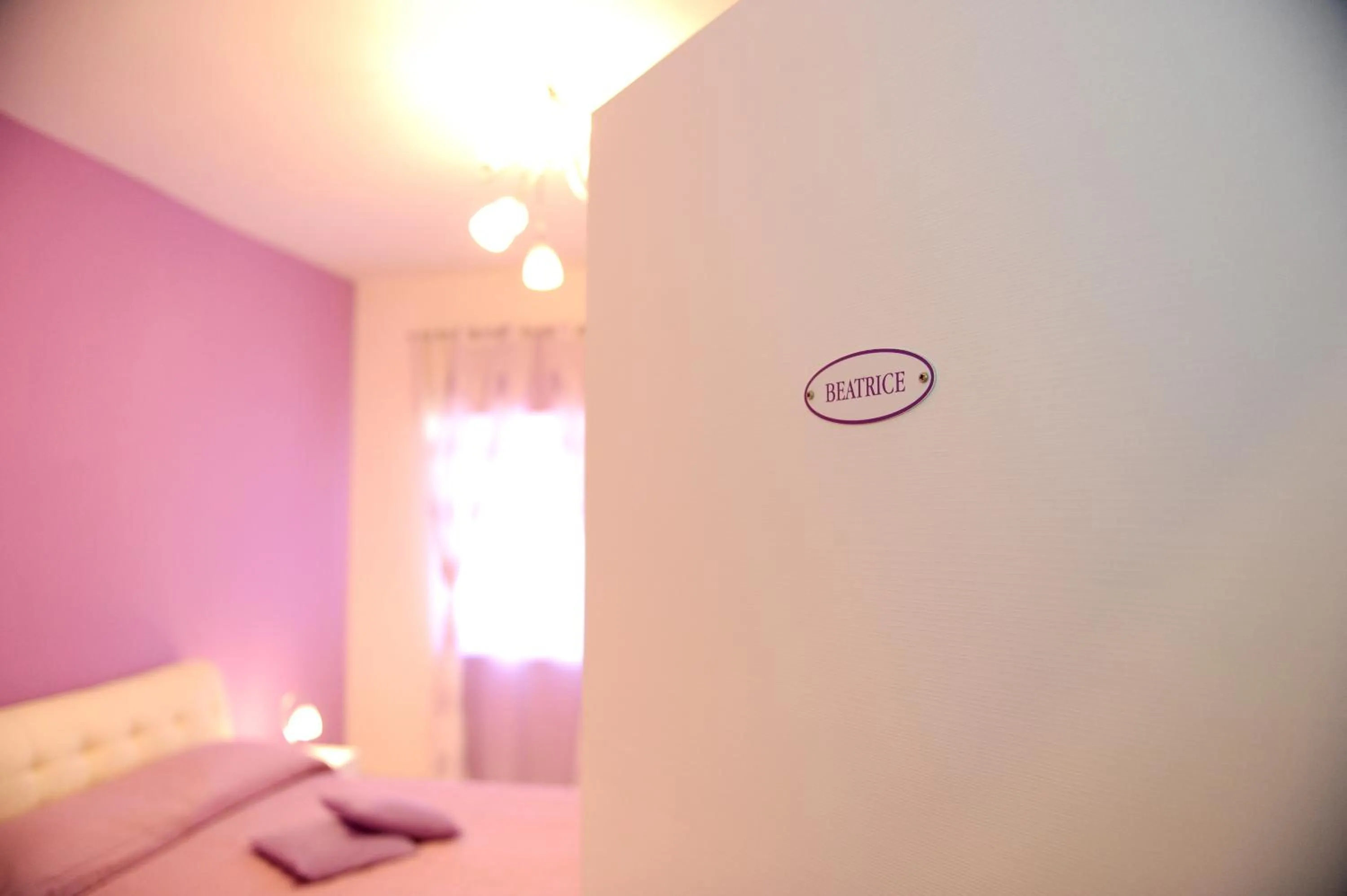 Bed in L'Isola Del Postino Rooms