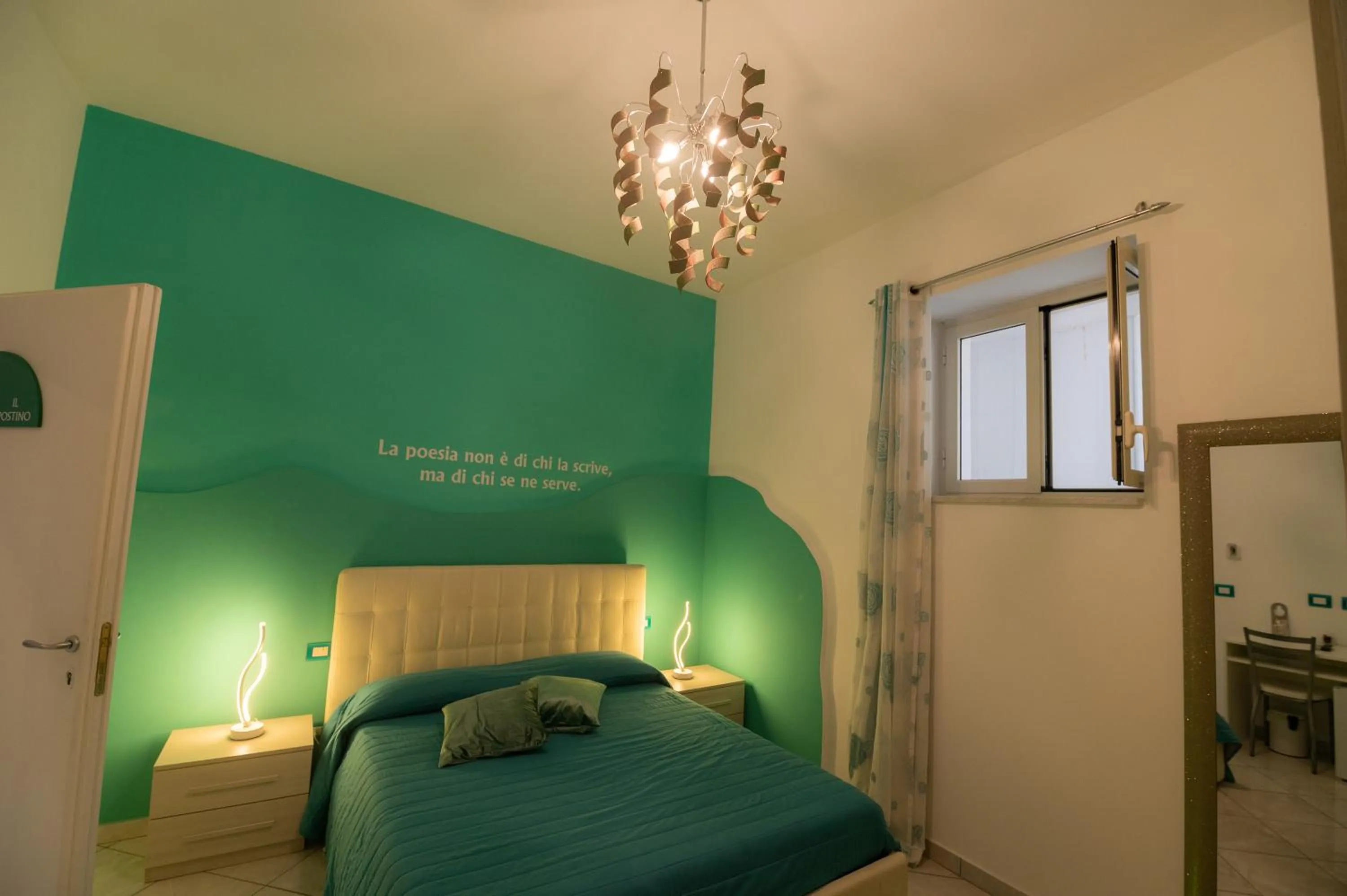 Bedroom in L'Isola Del Postino Rooms