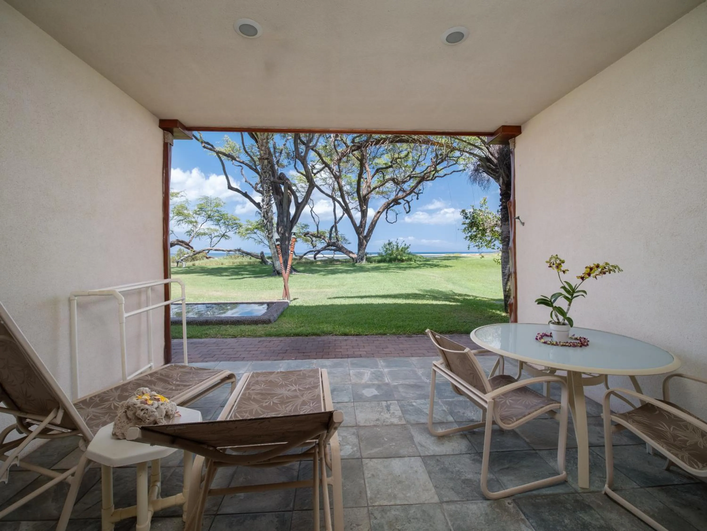 Patio in Aloha Aku CoCoPalm2 Suite - Your Cozy Beachfront Escape