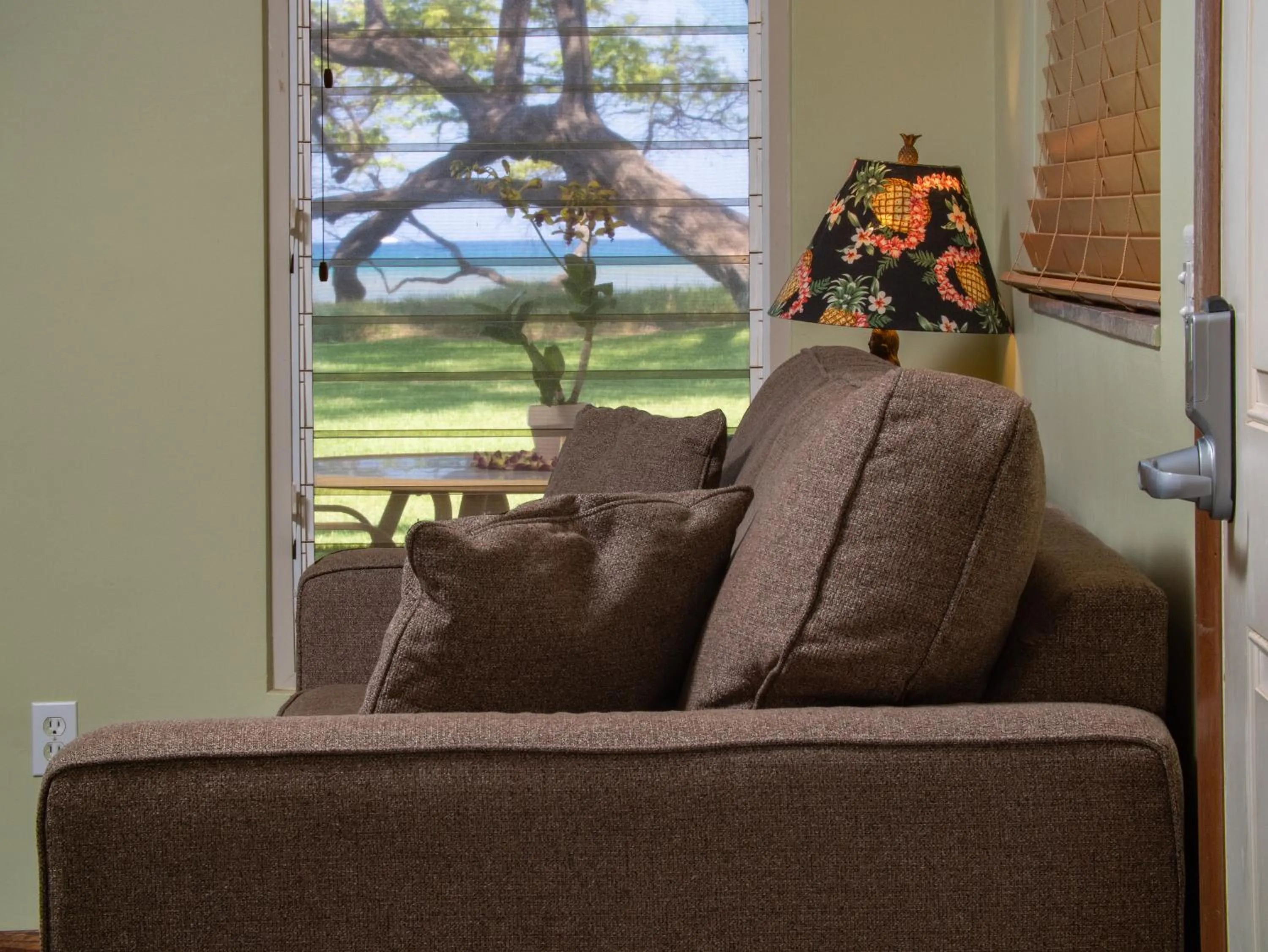 Living room in Aloha Aku CoCoPalm2 Suite - Your Cozy Beachfront Escape