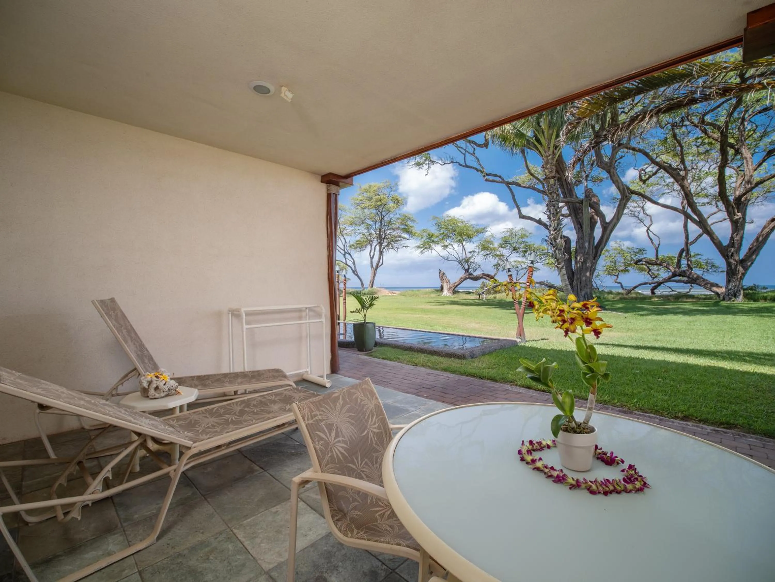 Patio in Aloha Aku CoCoPalm2 Suite - Your Cozy Beachfront Escape