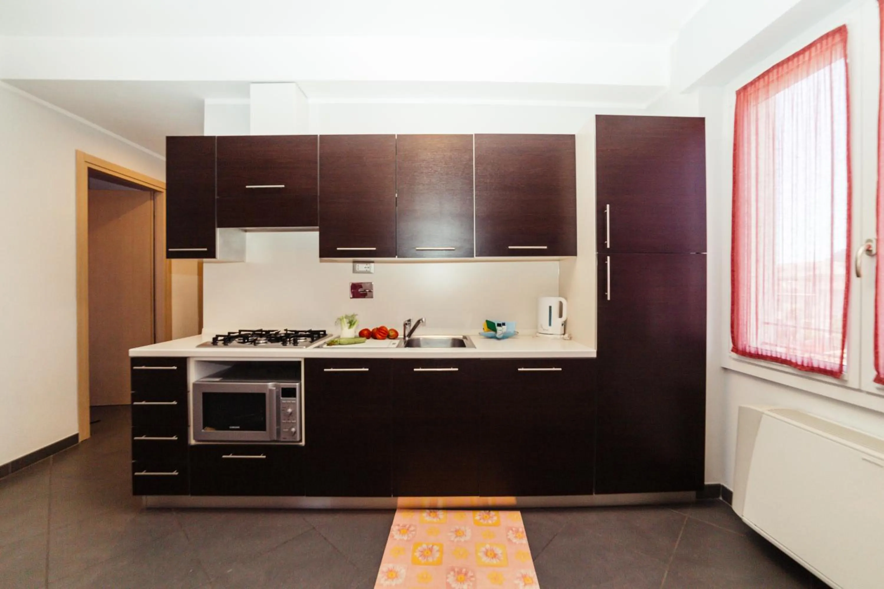 Kitchen or kitchenette in Residence Greco