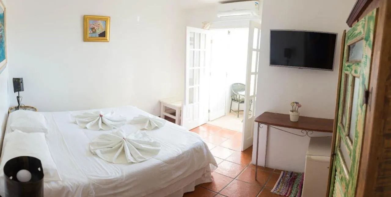 Bed in Pousada Hotel Praia dos Anjos