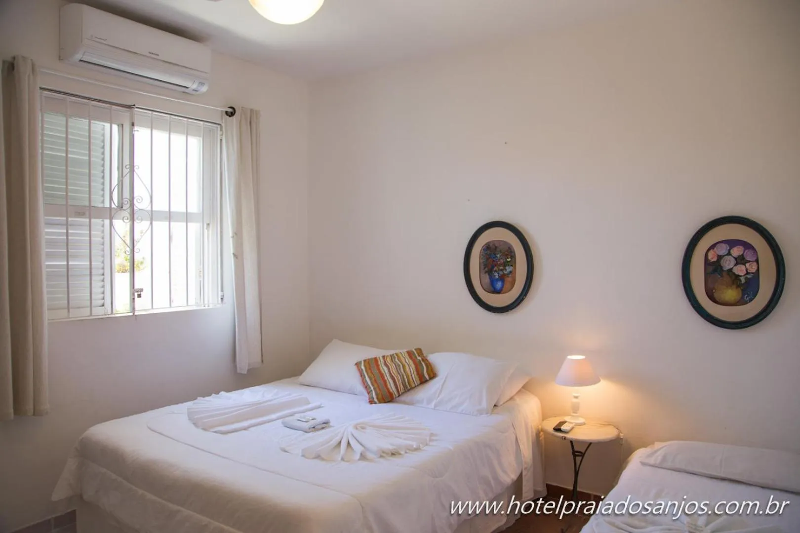 Bed in Pousada Hotel Praia dos Anjos