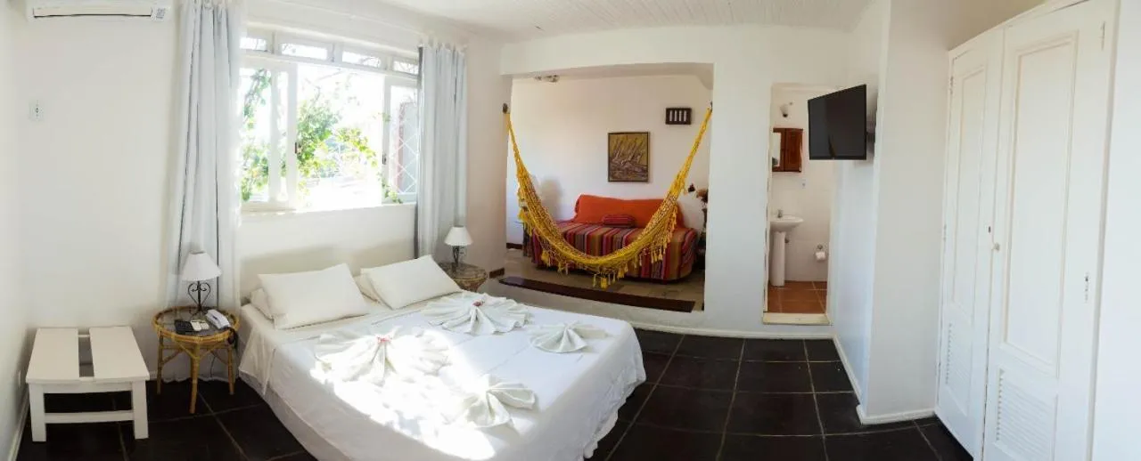 Bed in Pousada Hotel Praia dos Anjos
