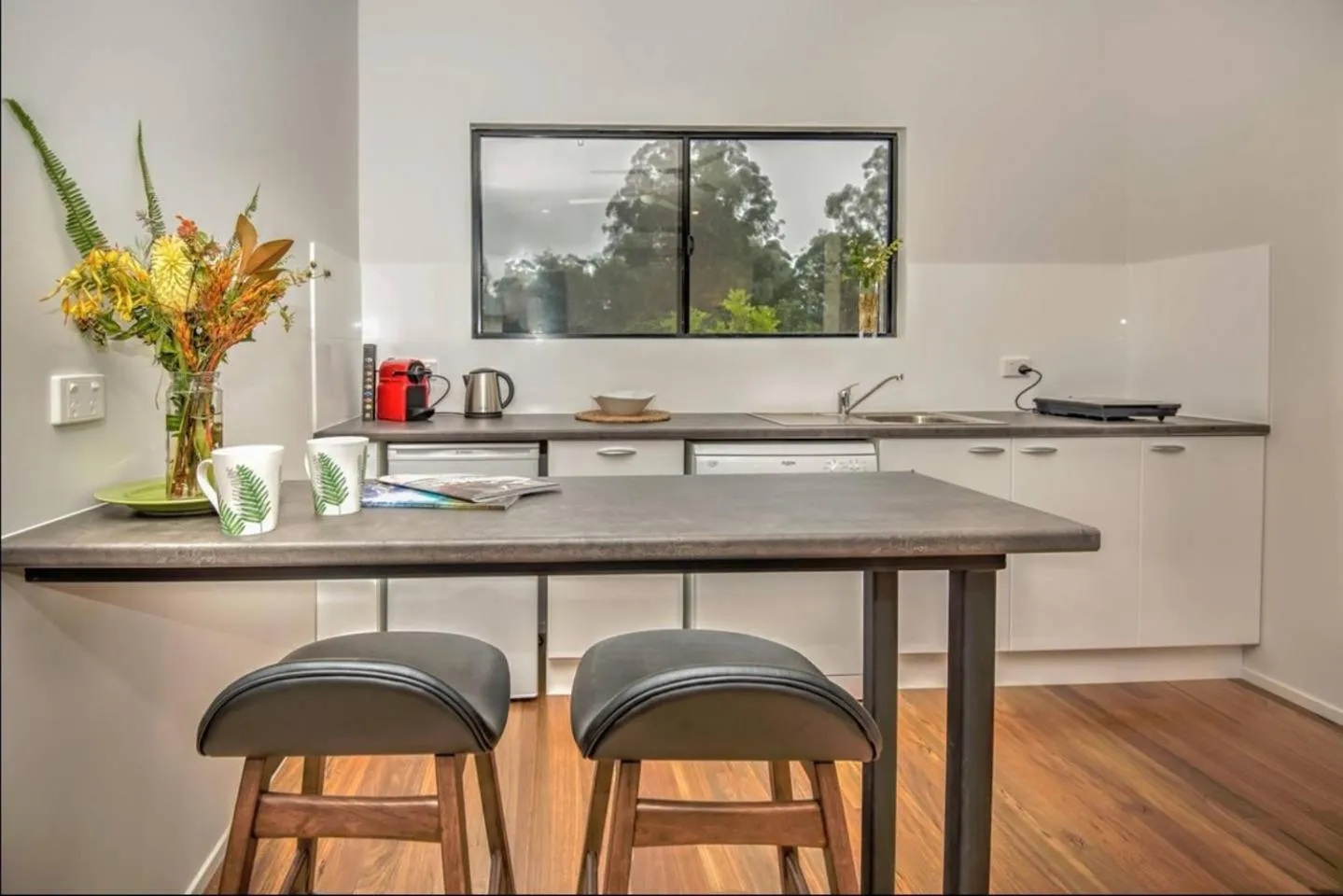 Kitchen or kitchenette in Eumundi Cottages - Cottage 1