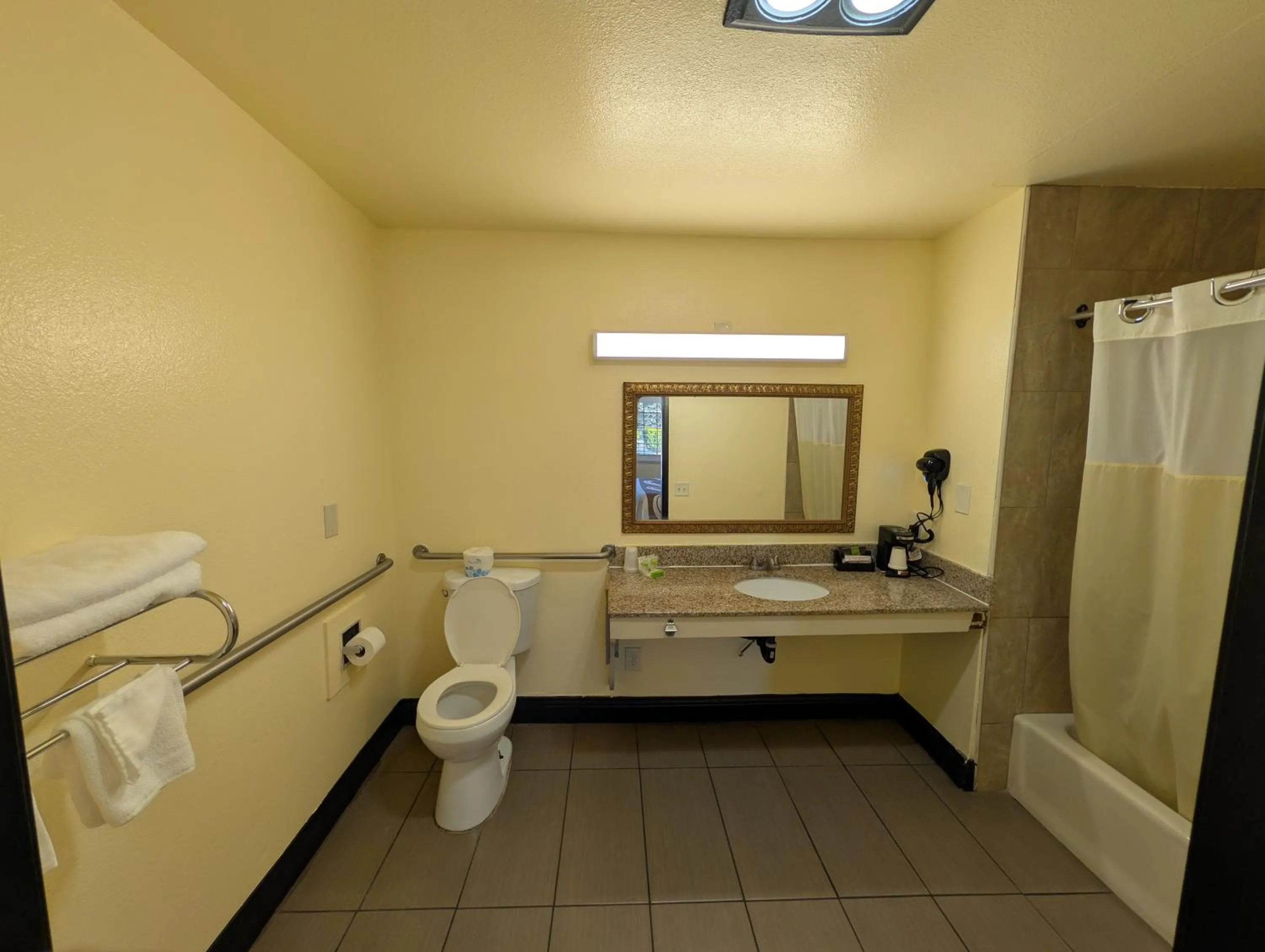 Bathroom in Crossroads Inn - Downtown Sacramento