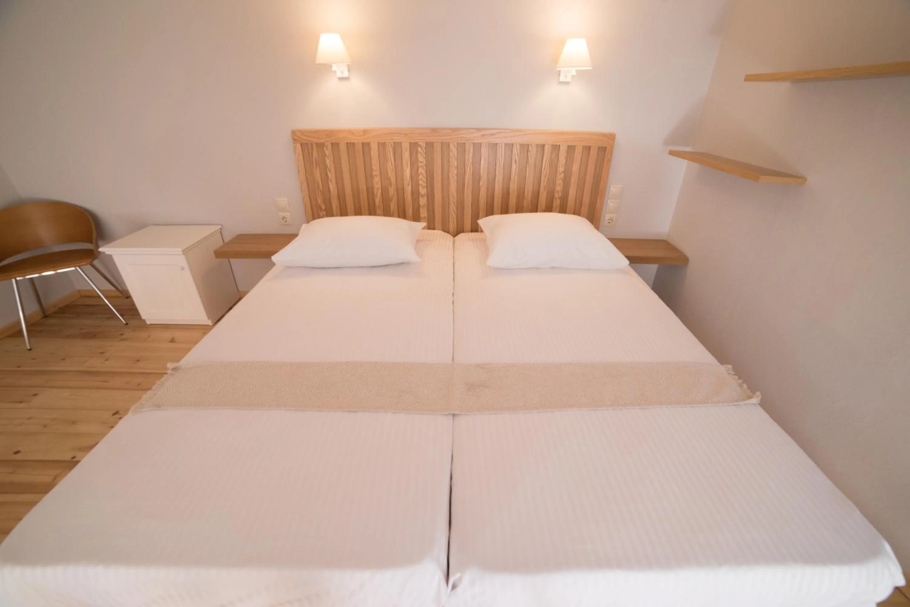 Bed in Mythos Suites Diskos