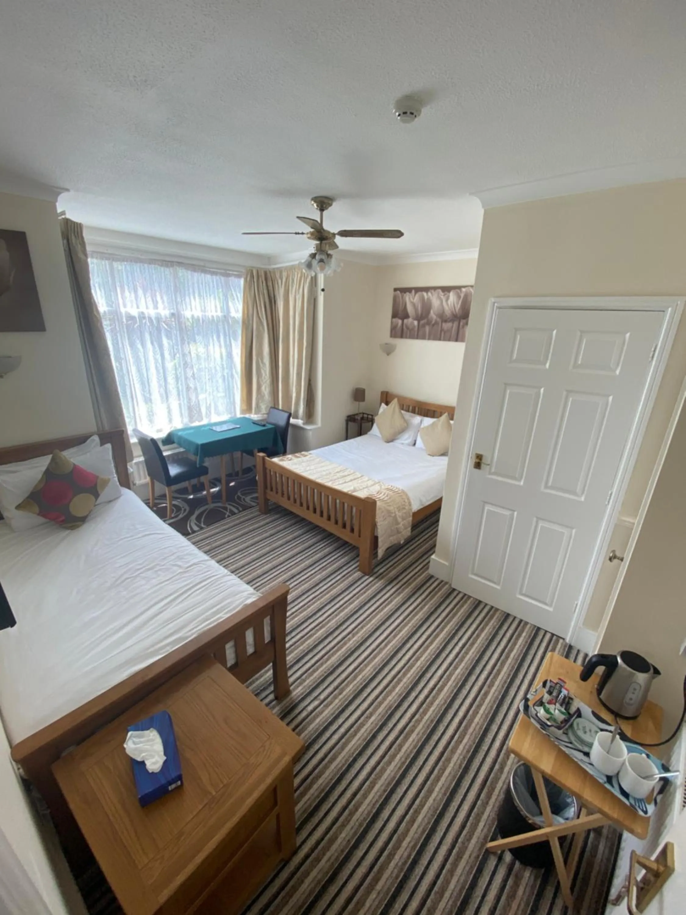 Bed in Four Seasons Guest House