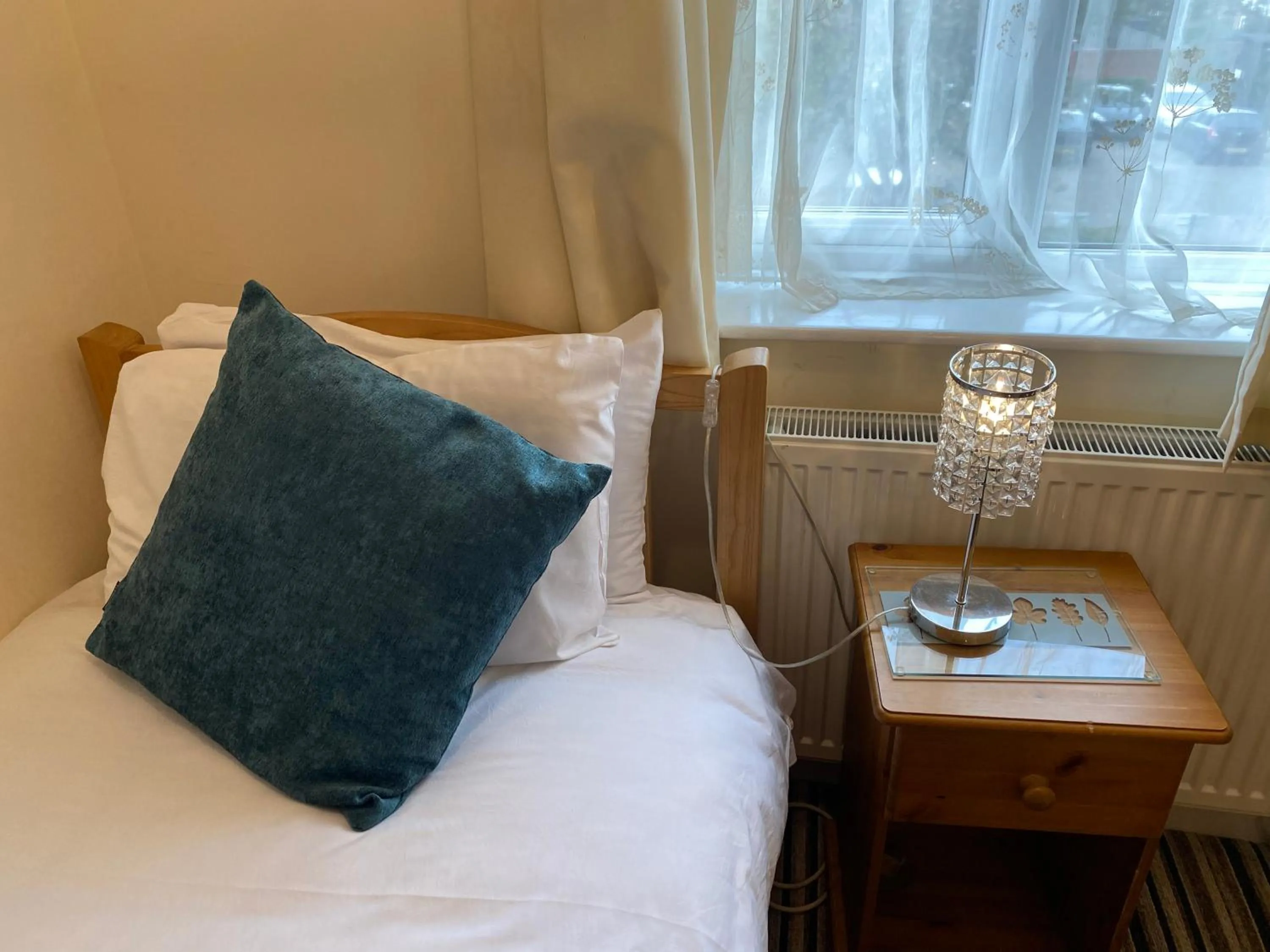 Bed in Four Seasons Guest House