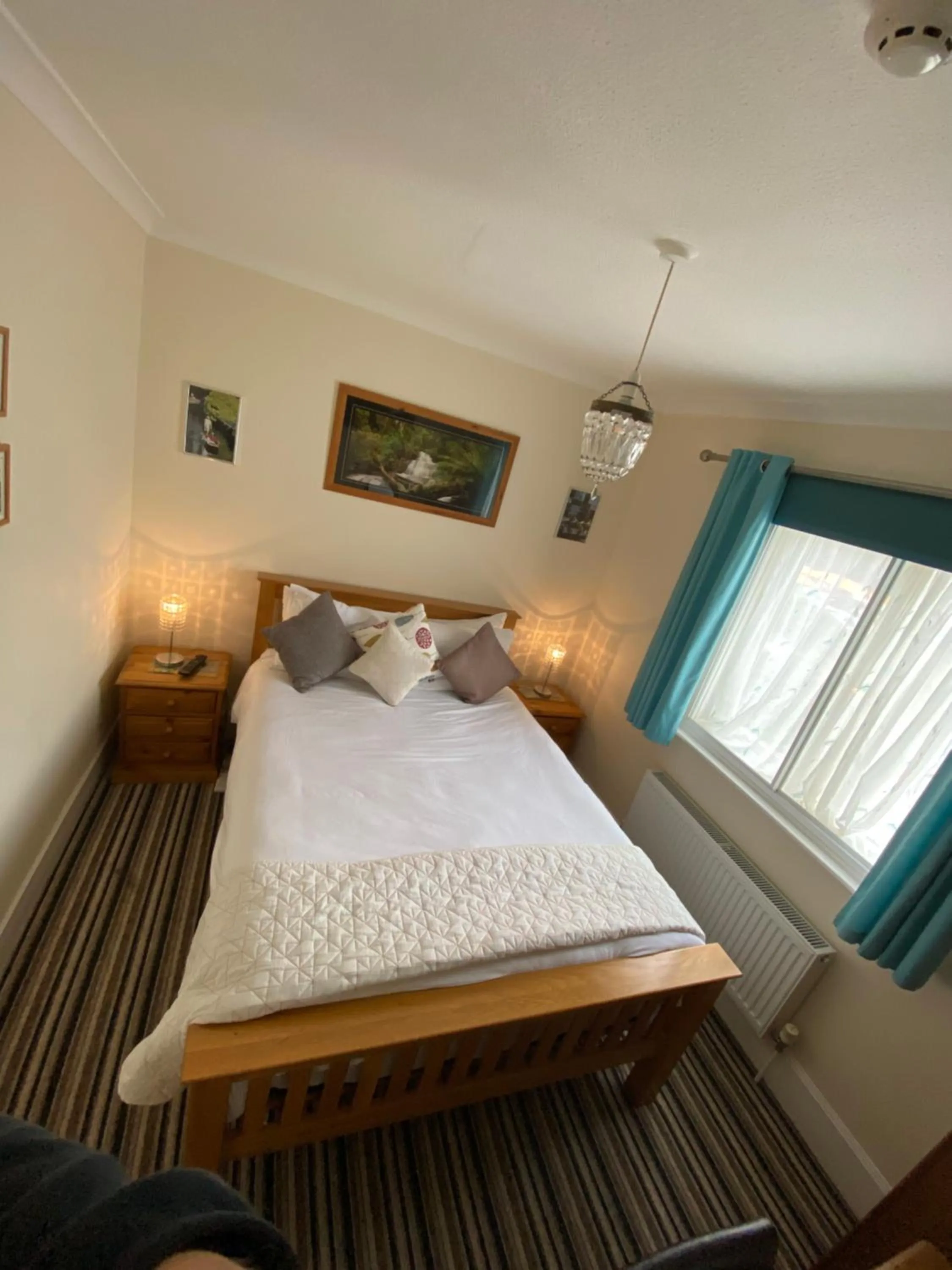 Bed in Four Seasons Guest House