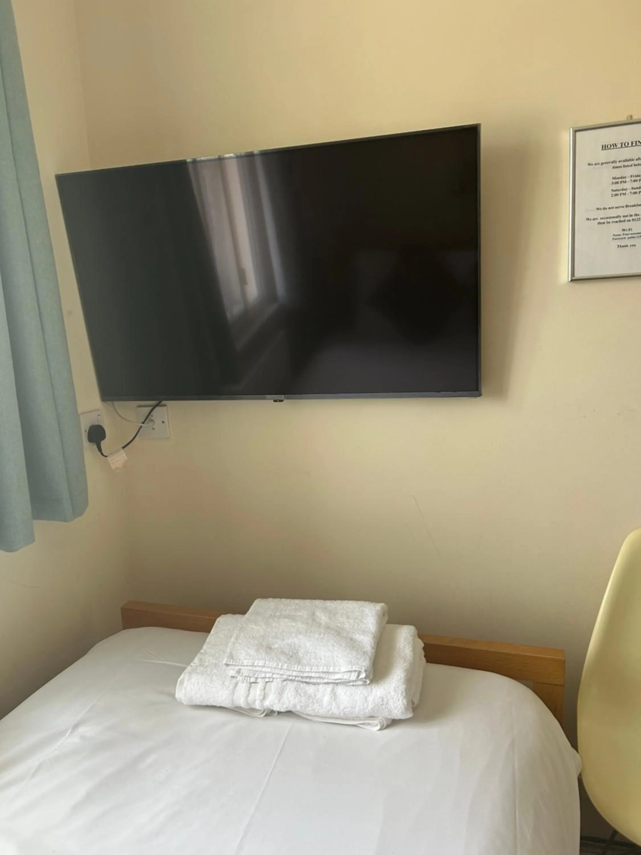 Bed in Four Seasons Guest House