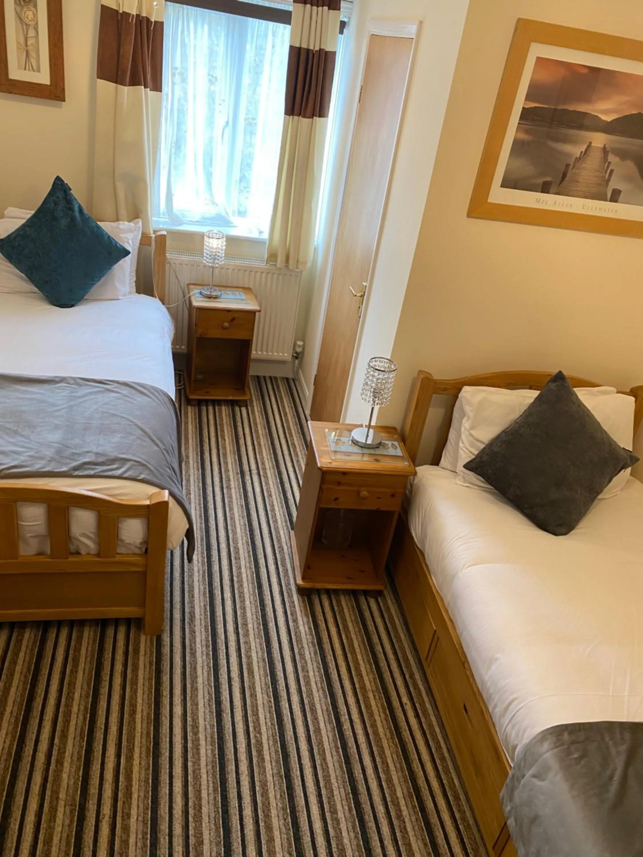 Bed in Four Seasons Guest House