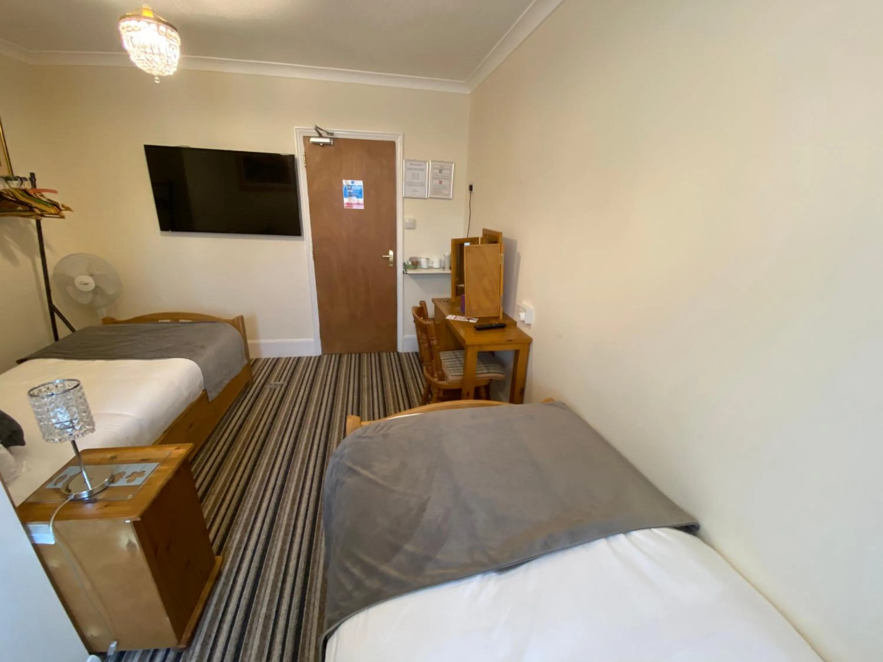 Bed in Four Seasons Guest House