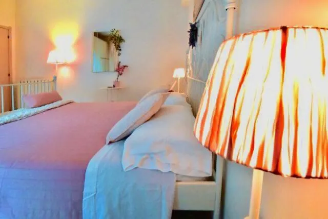 Bed in La Casa di Isabella Loreto