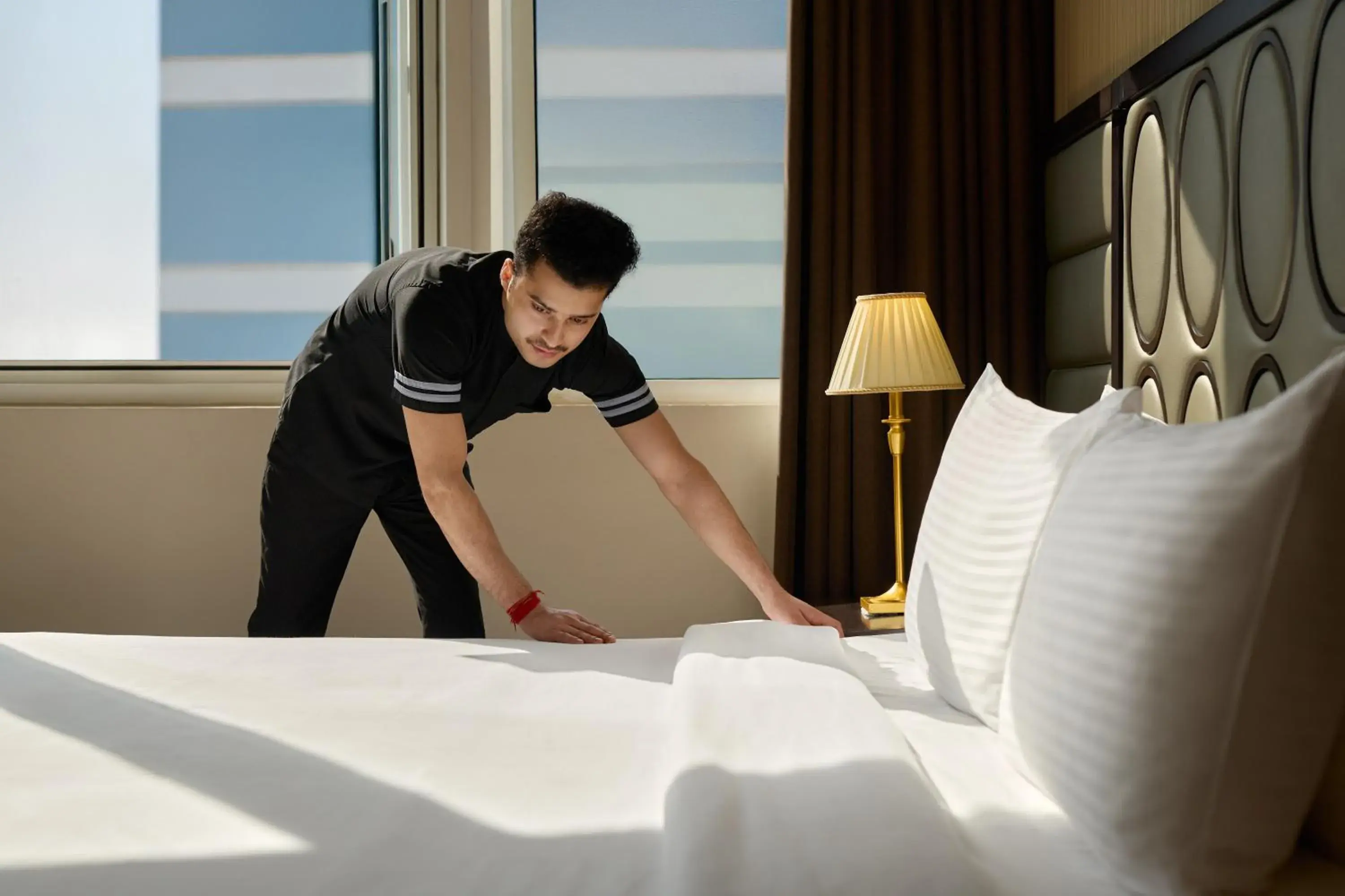 Staff, Bed in Golden Tulip Doha Hotel Staff, Bed in Golden Tulip Doha Hotel