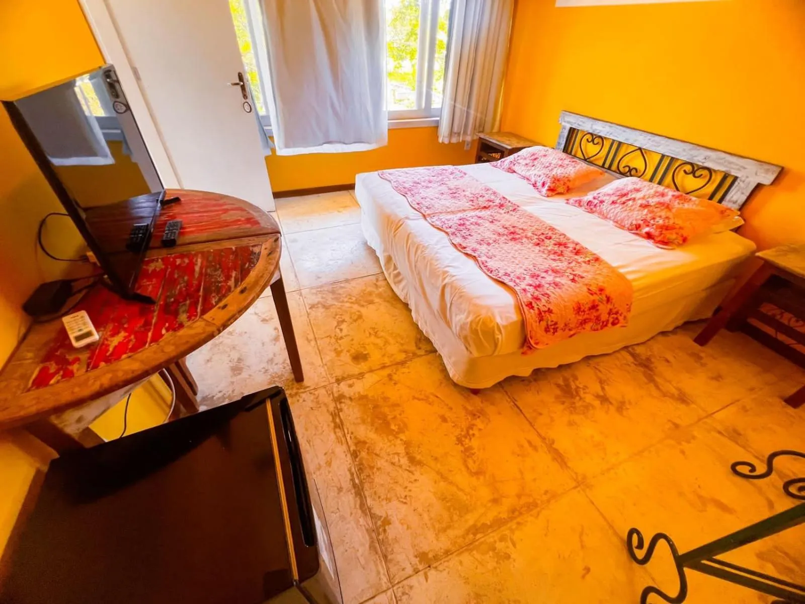 Bed in Bon Bini Pousada