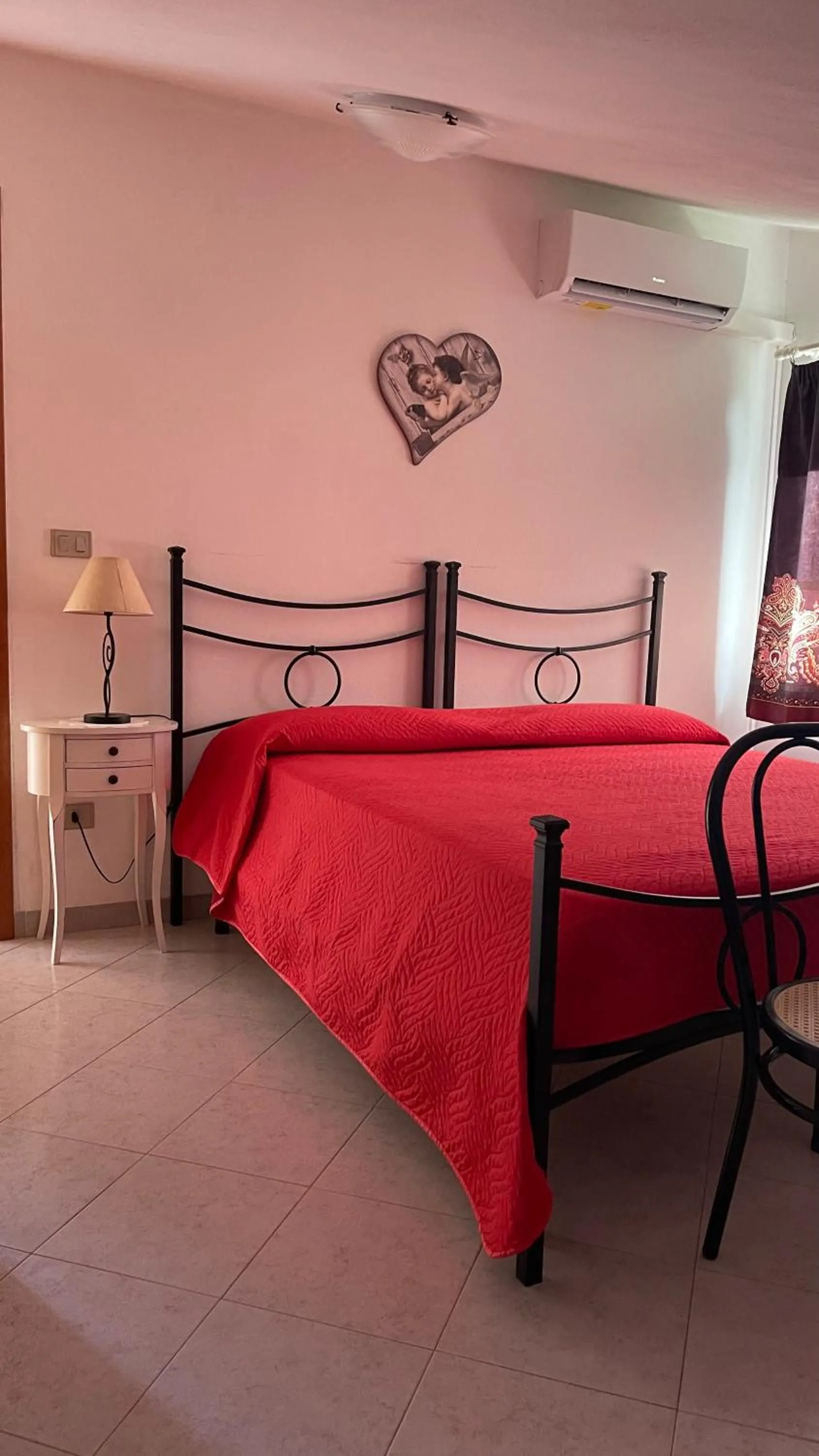 Photo of the whole room, Bed in La Mansarda