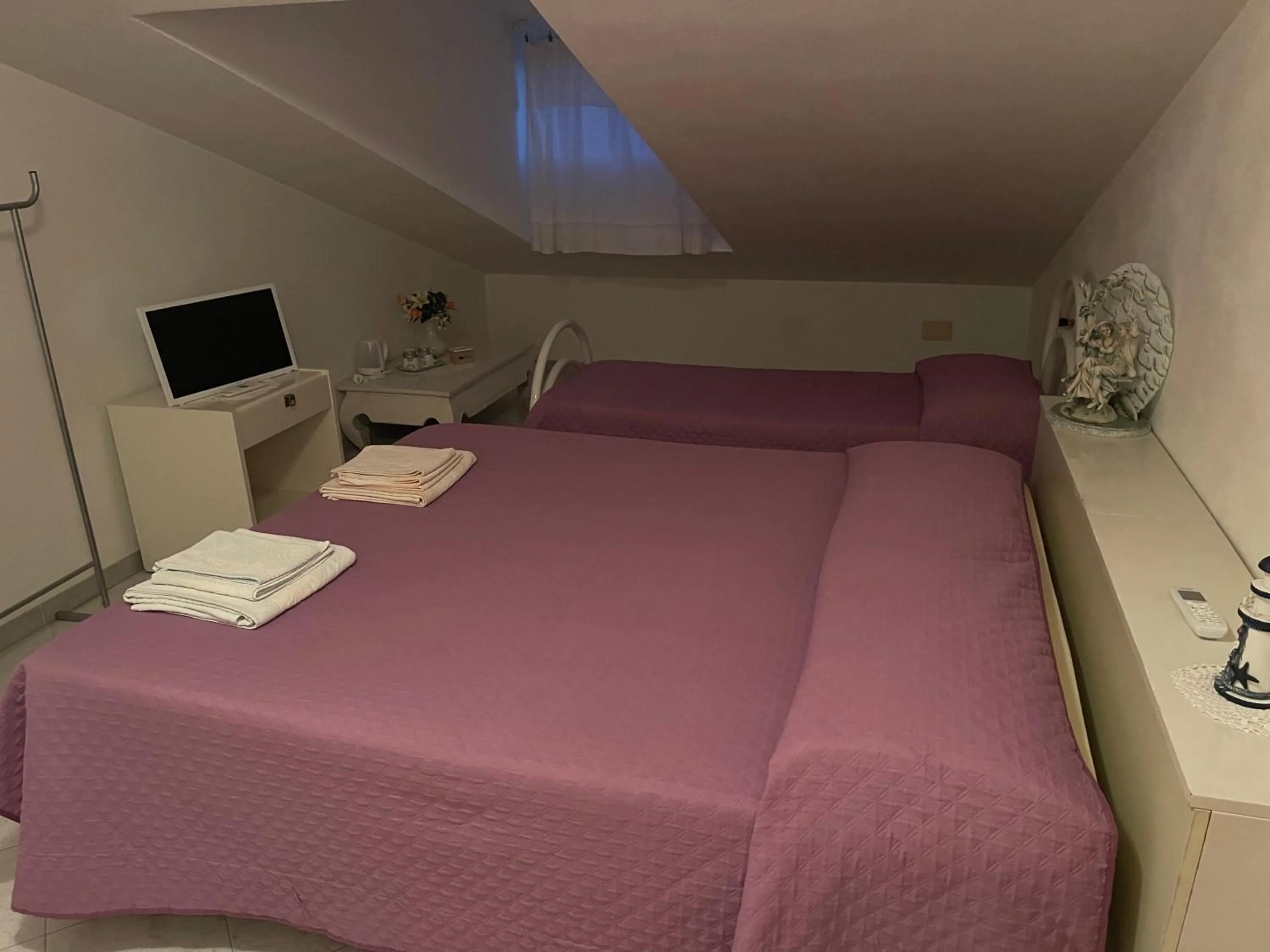 Bed in La Mansarda