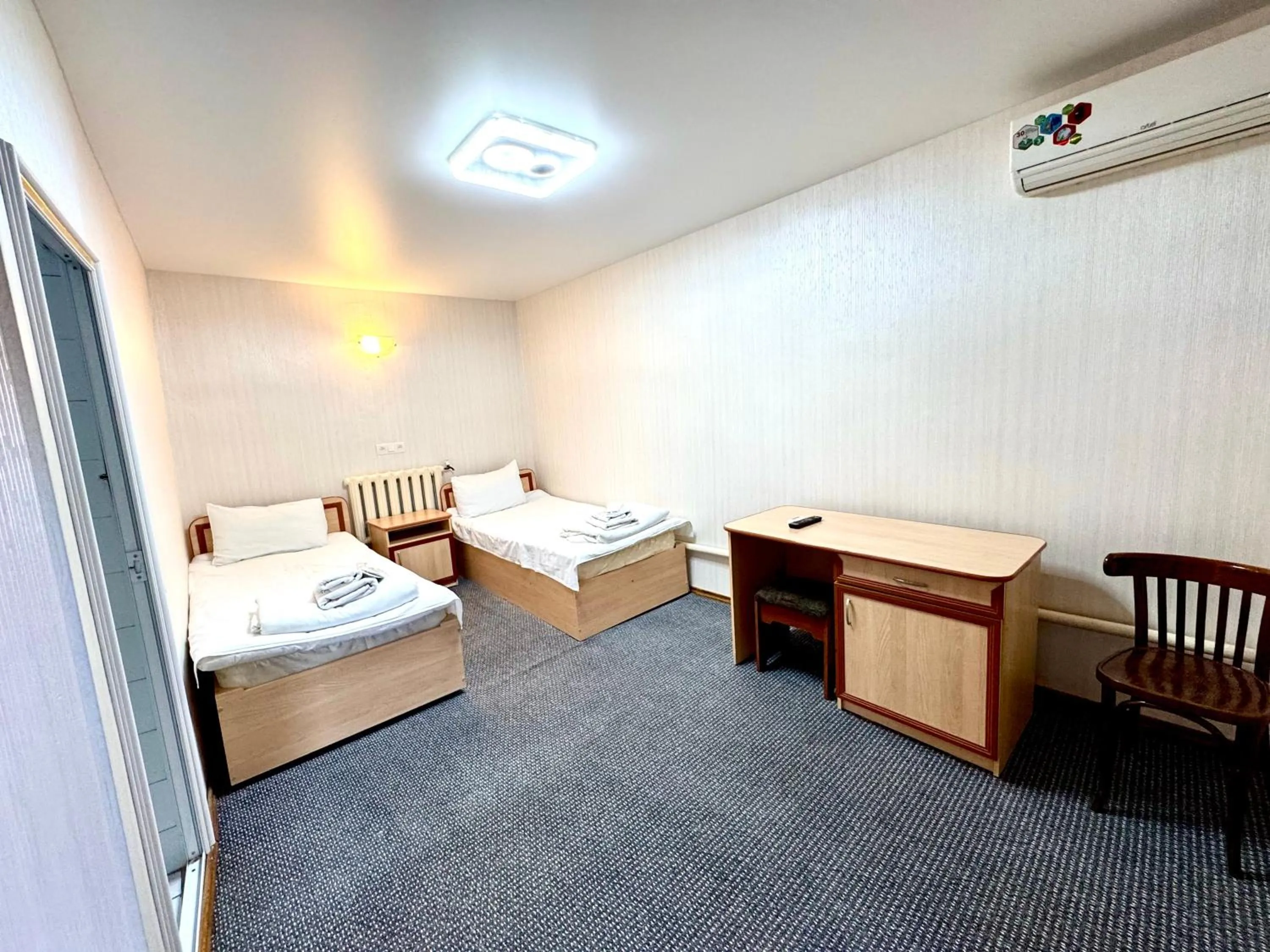 Living room, Bed in Bukhara house hotel