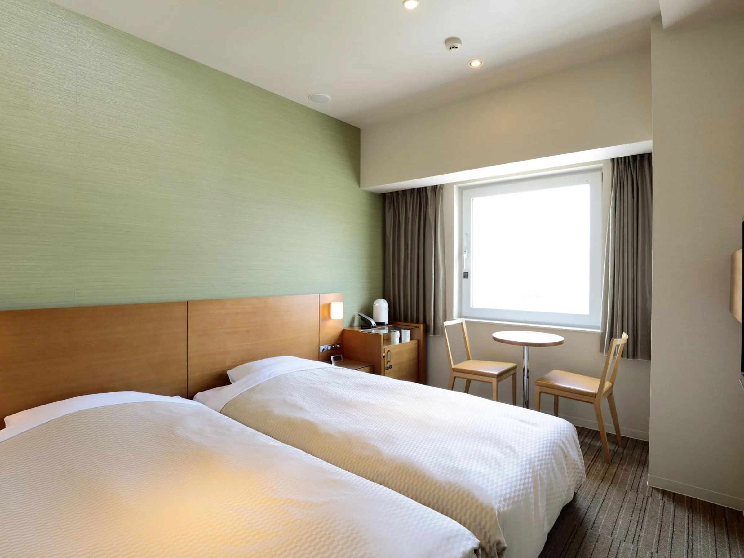 Bed in Candeo Hotels Chino