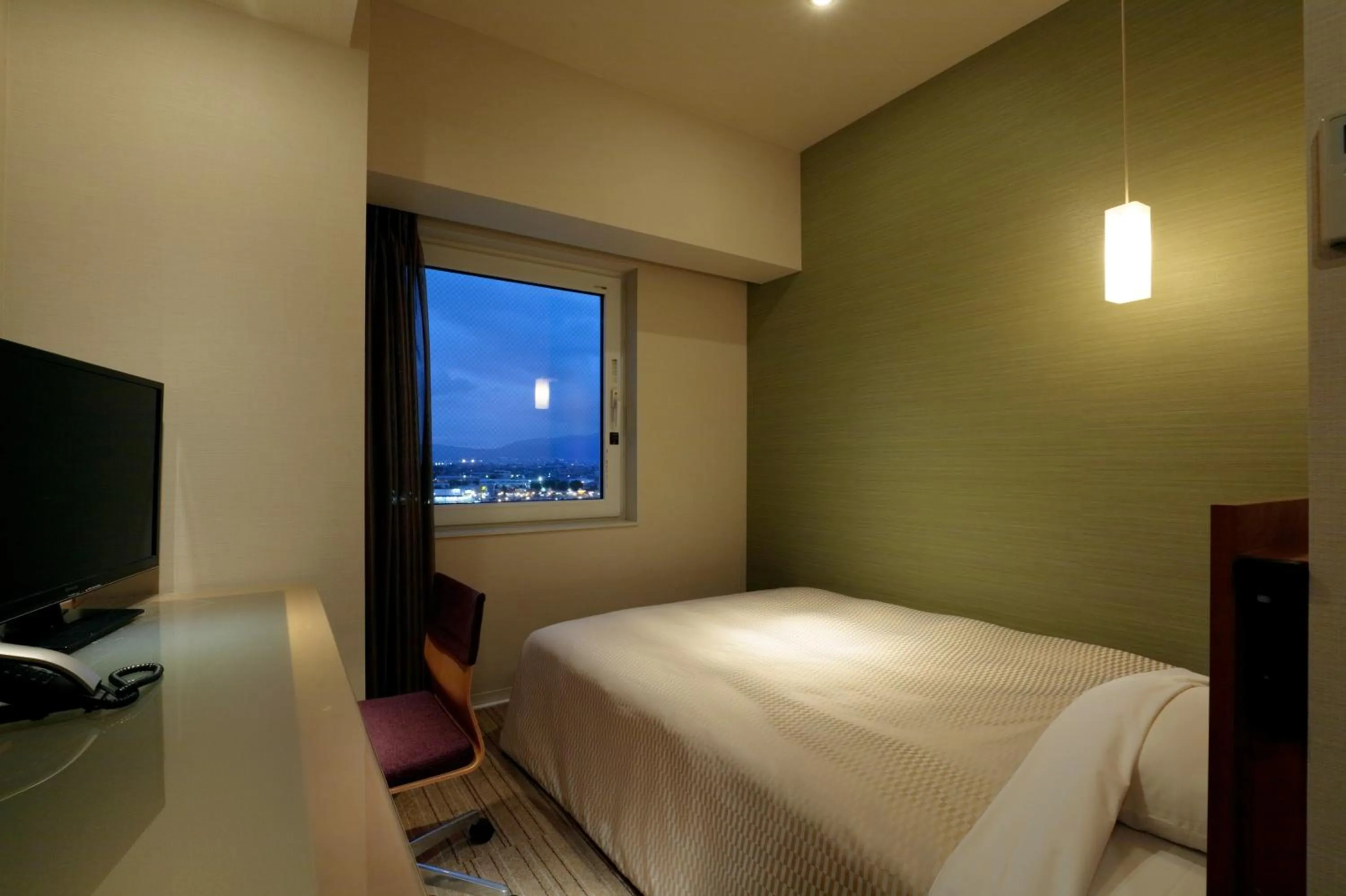 Bed in Candeo Hotels Chino