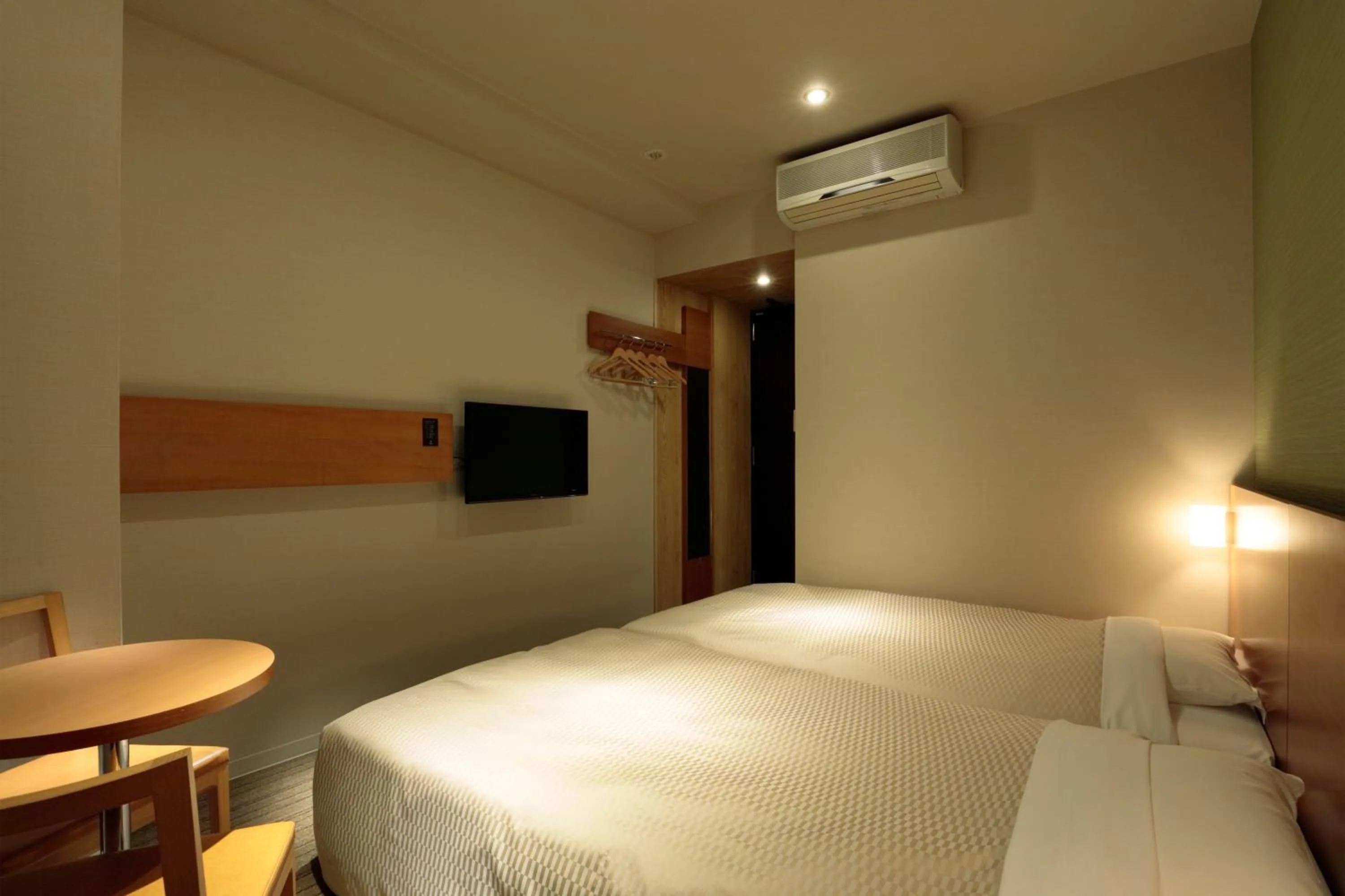 Bed in Candeo Hotels Chino